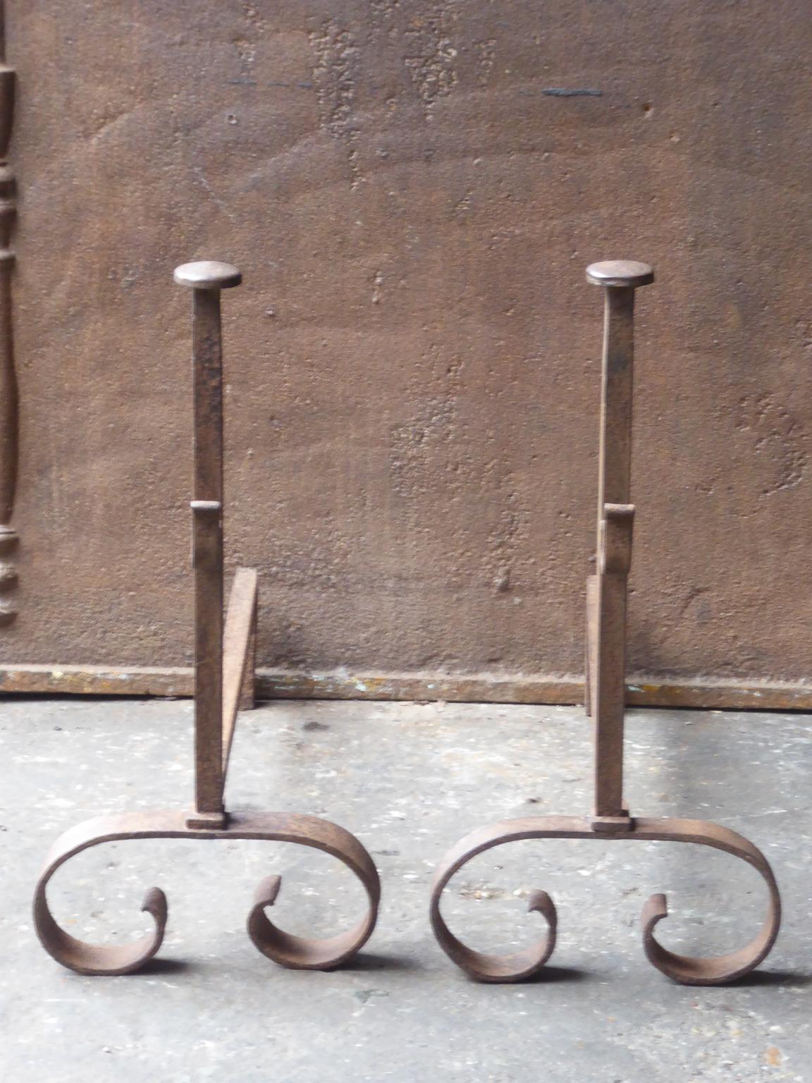 19th century French Napoleon III andirons. The andirons are made or wrought iron and have spit hooks to grill food. The condition is good.







 