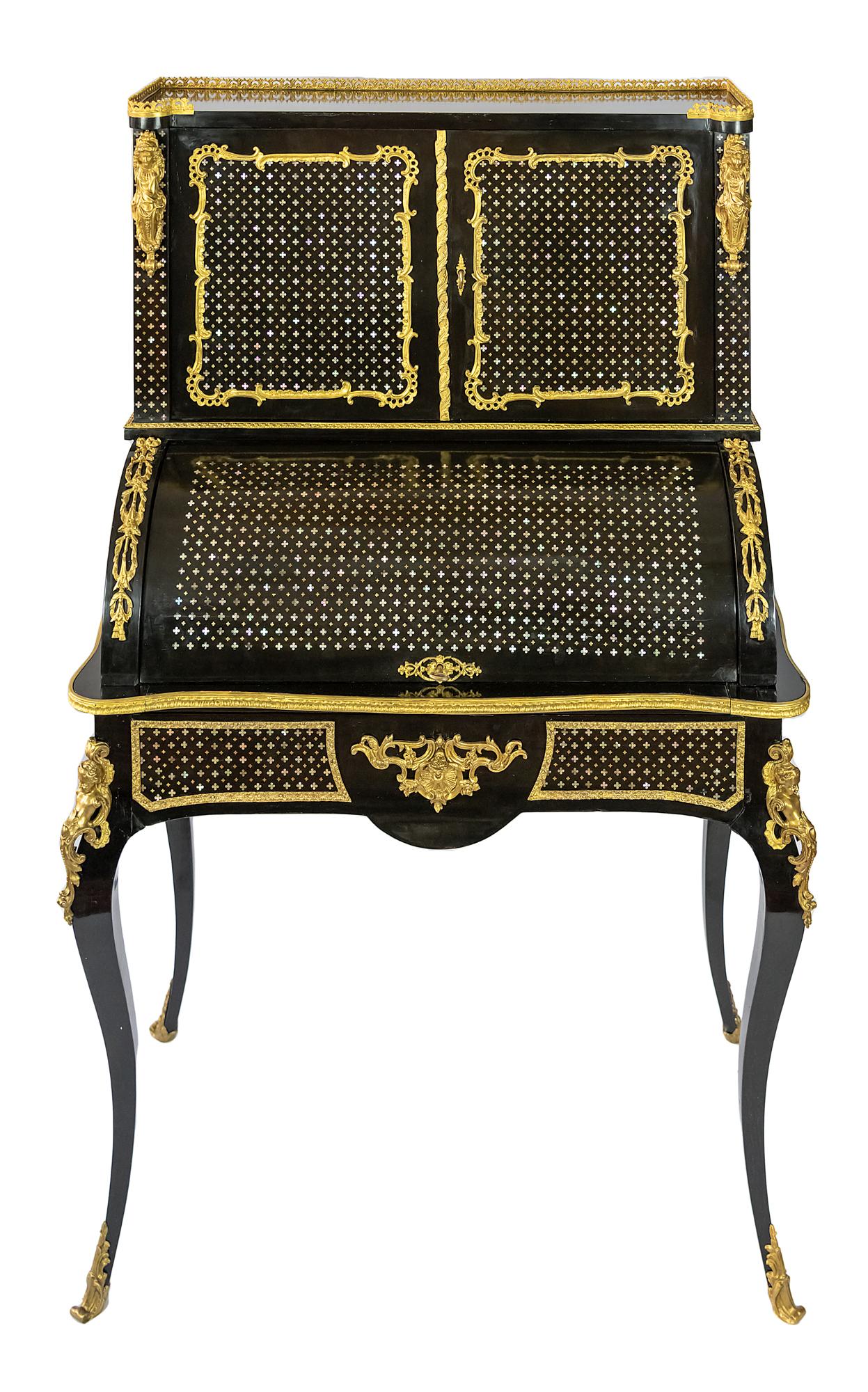 19th century French antique secretaire in black polished wood and verneer by Alphonse Giroux et Cie. Paris. 
The surface is decorated with mother of pearl inlay combined with bronze elements.
The table drawer with a sliding element inside covered