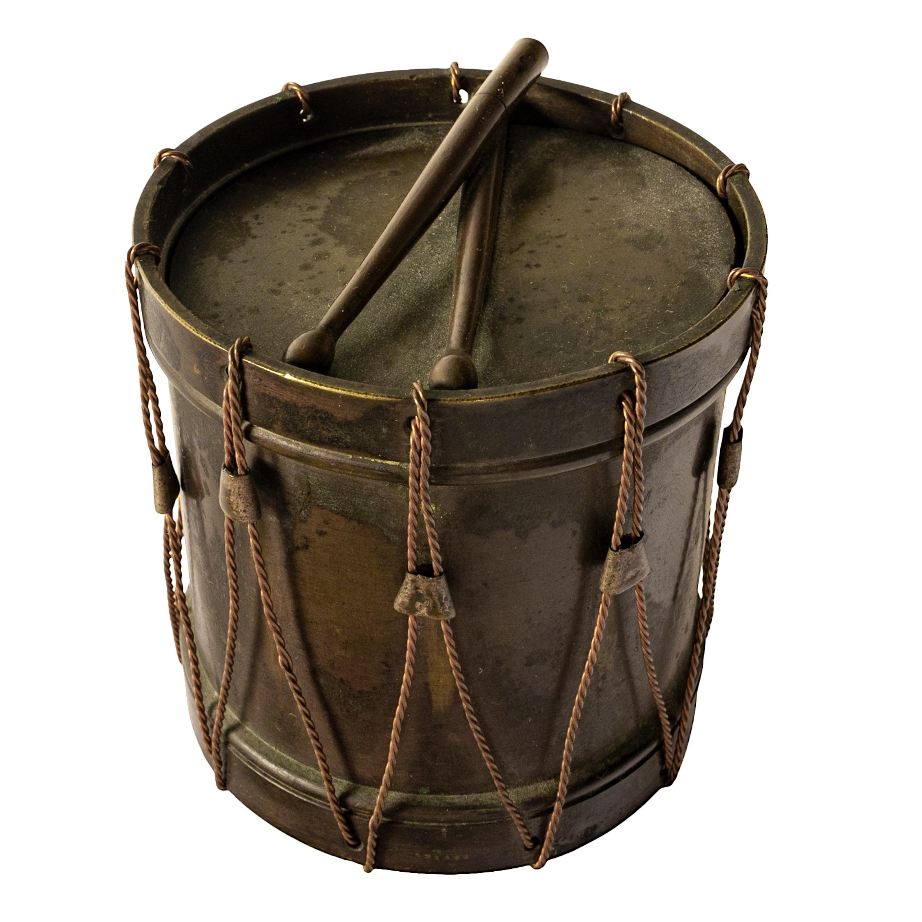 A good antique French 'Grand Tour' bronze novelty inkwell modeled as a drum, circa 1850.
The inkwell is finely & realistically cast as a French Revolutionary period drum. The inkwell's lid has a pair crossed drumsticks to lift the lid and enclosed