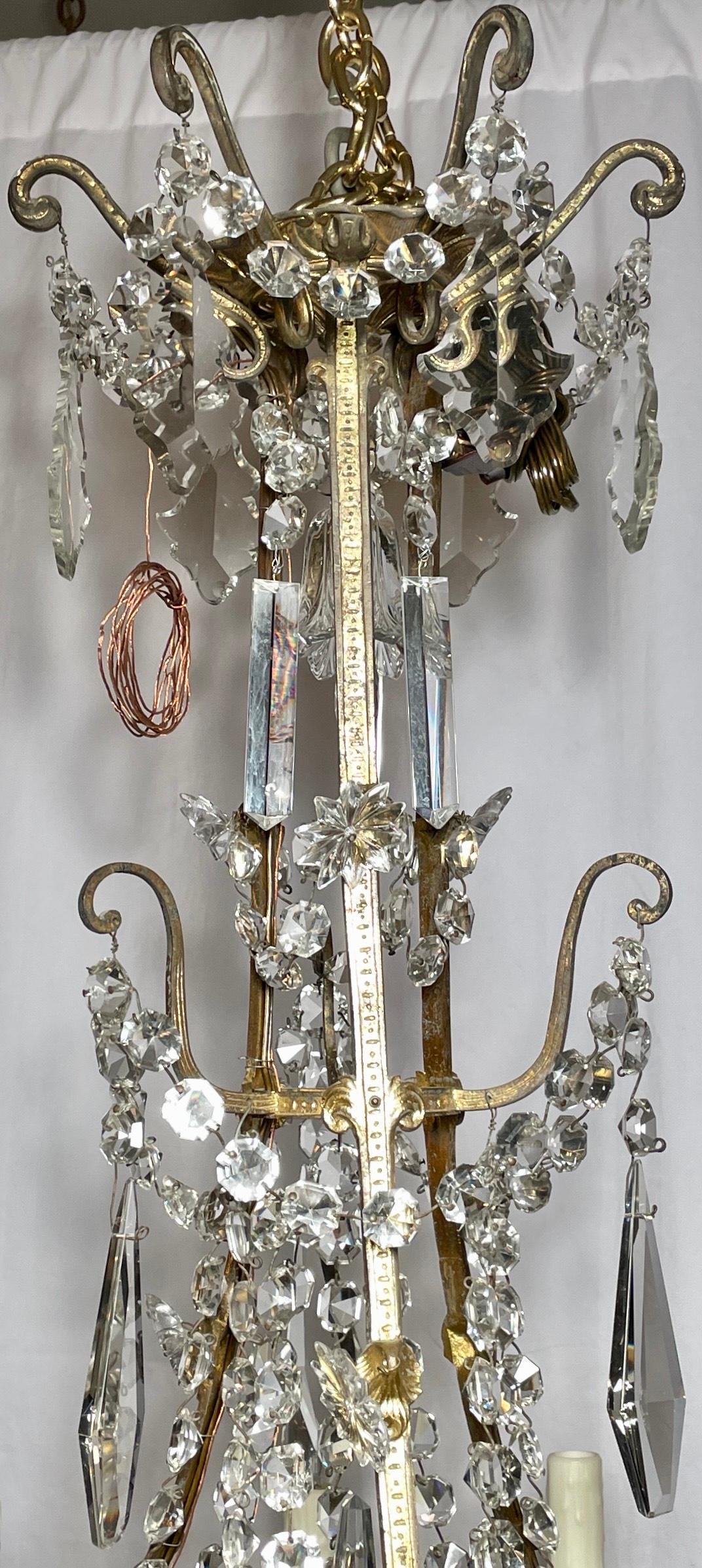 Antique French Napoleon III crystal and gold bronze 12-light chandelier, circa 1890's.