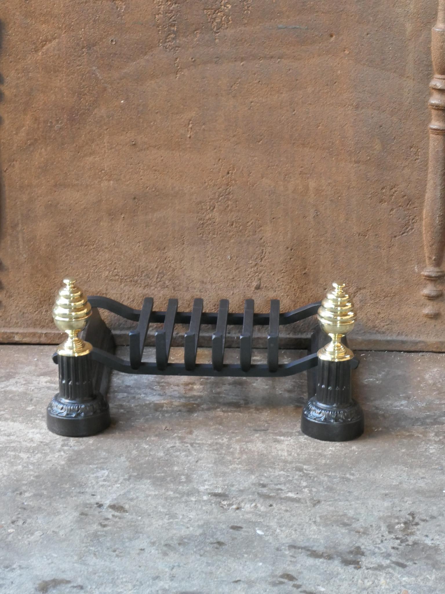 19th century French Napoleon III andirons made of cast iron and polished brass with a recently forged grate. The basket is in a good condition and is fully functional.