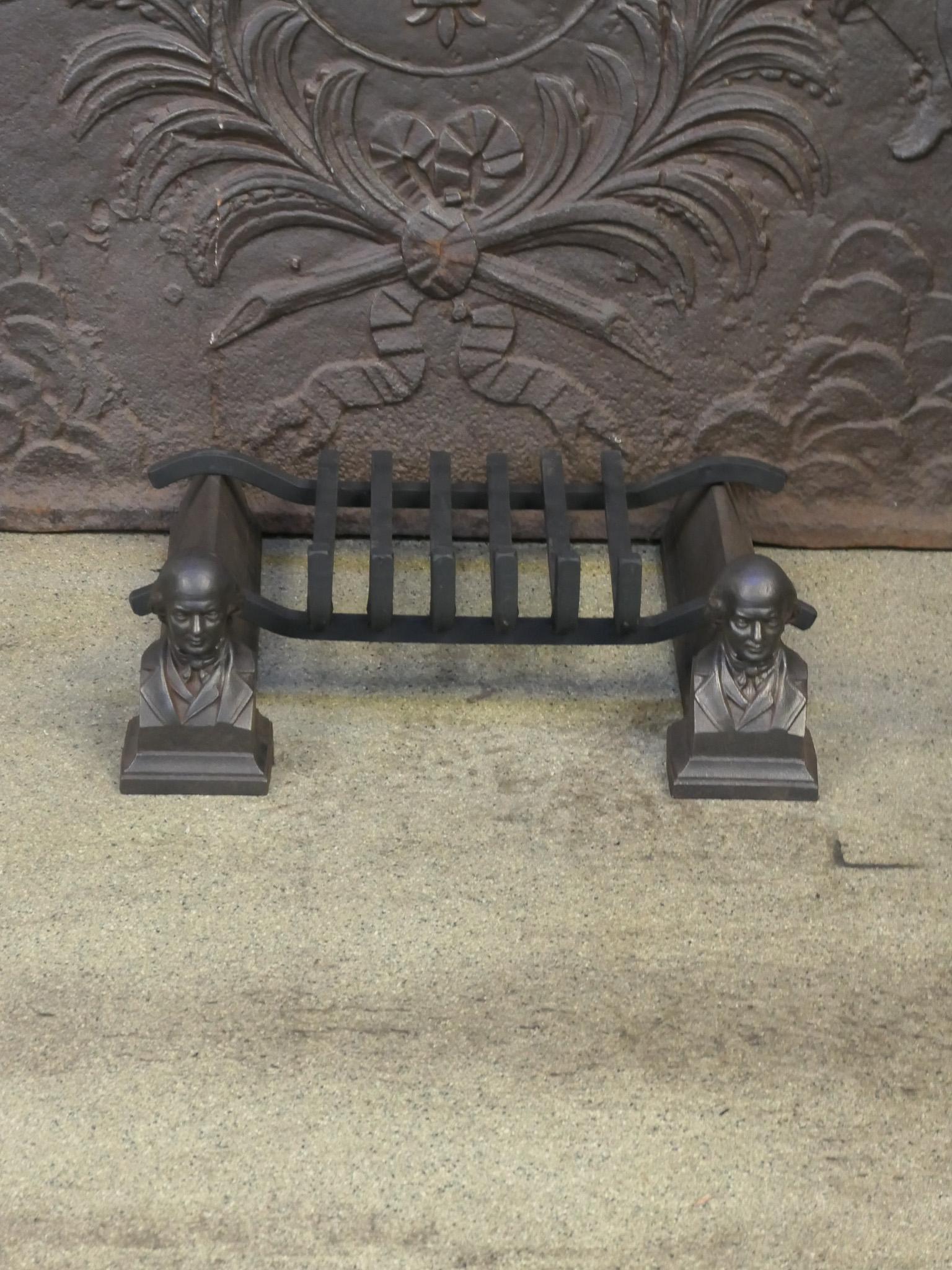 19th century French fireplace grate. The grate consists of two Napoleon III period andirons, made of cast iron, and a recently forged grate, made of wrought iron.

The basket is in a good condition and is fully functional.

