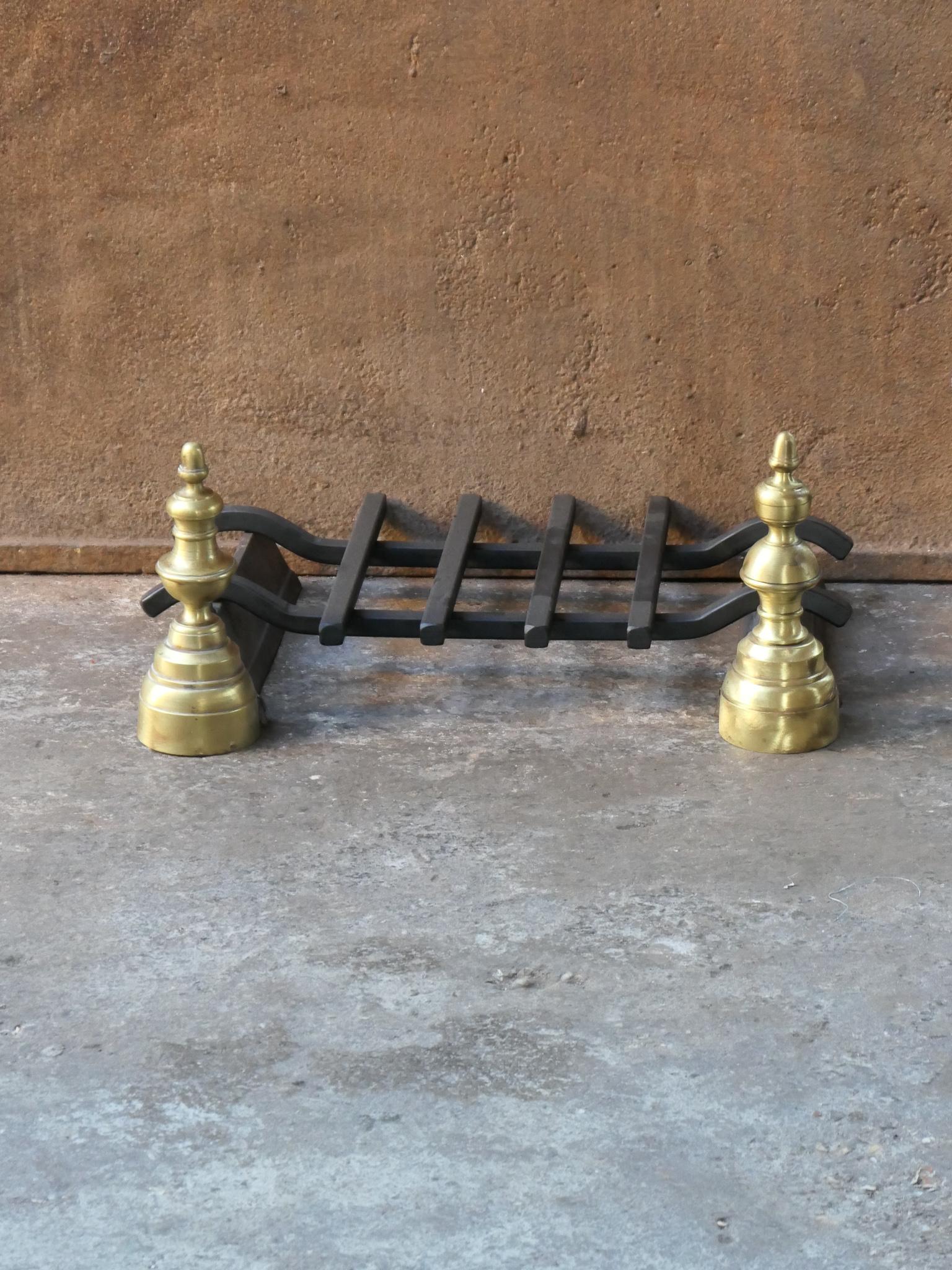 Late 19th or early 20th century French Napoleon III period fireplace basket with period andirons and new grate. The fire basket is made of wrought iron and brass. The basket is in a good condition and is fully functional.