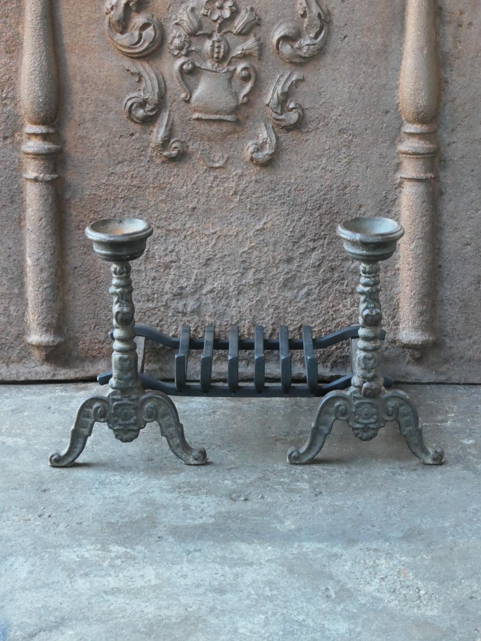 Late 19th or early 20th century French Napoleon III fireplace basket, fire basket made of wrought iron and cast iron. The basket is in a good condition and is fully functional.