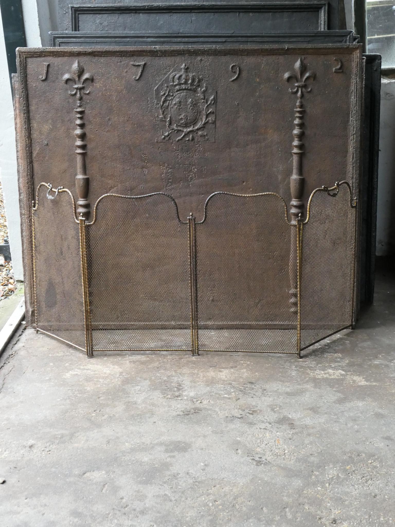 19th century French Napoleon III 4-panel fireplace screen. The screen is made of iron and iron mesh and has brass color. It is in a good condition and is fit for use in front of the fireplace.