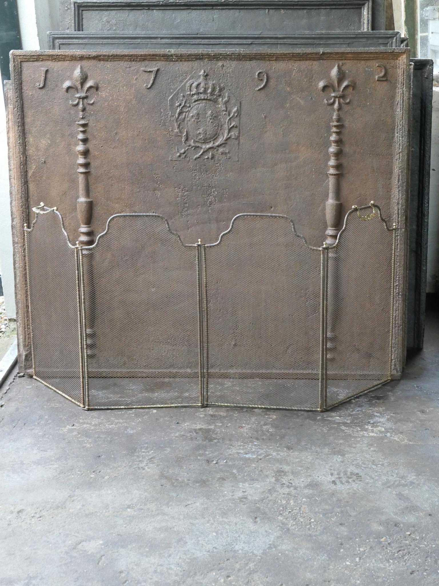 19th century French Napoleon III 4-panel fireplace screen. The screen is made of brass, iron and iron mesh. It is in a good condition and is fit for use in front of the fireplace.