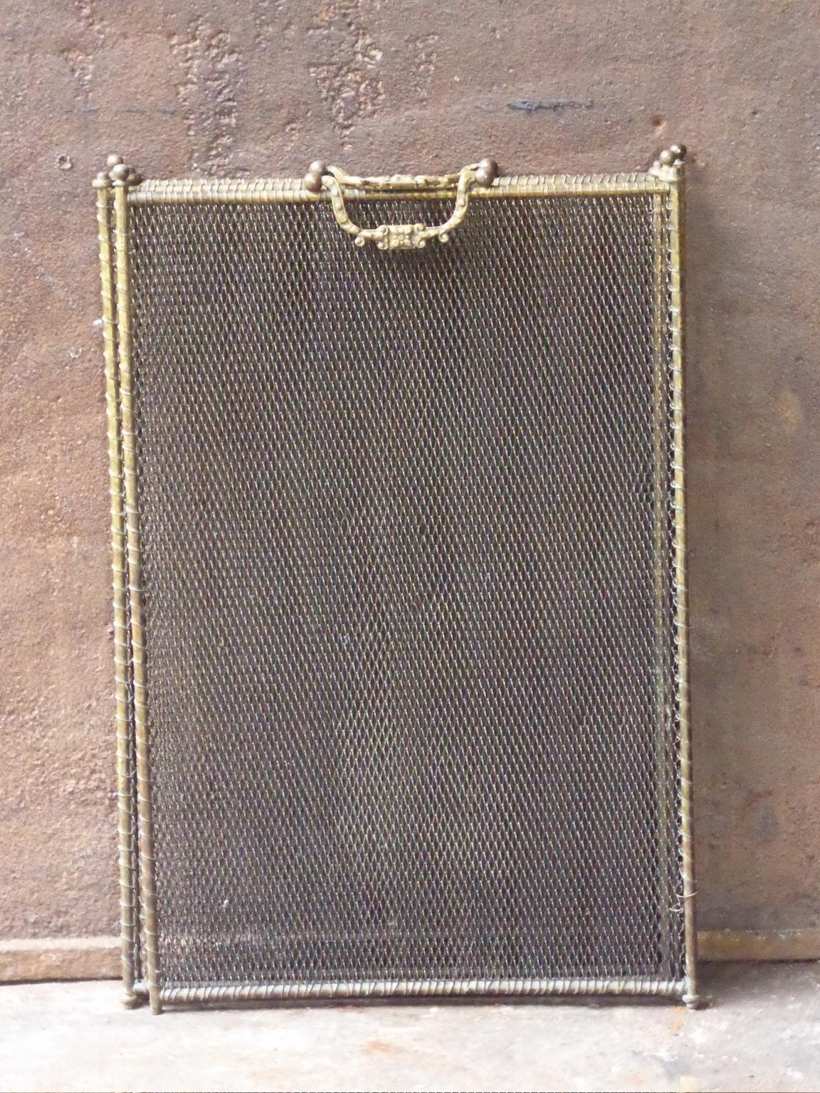 19th century French Napoleon III three-panel fire screen. The screen is made of brass, iron and iron mesh. It is in a good condition and is fit for use in front of the fireplace.