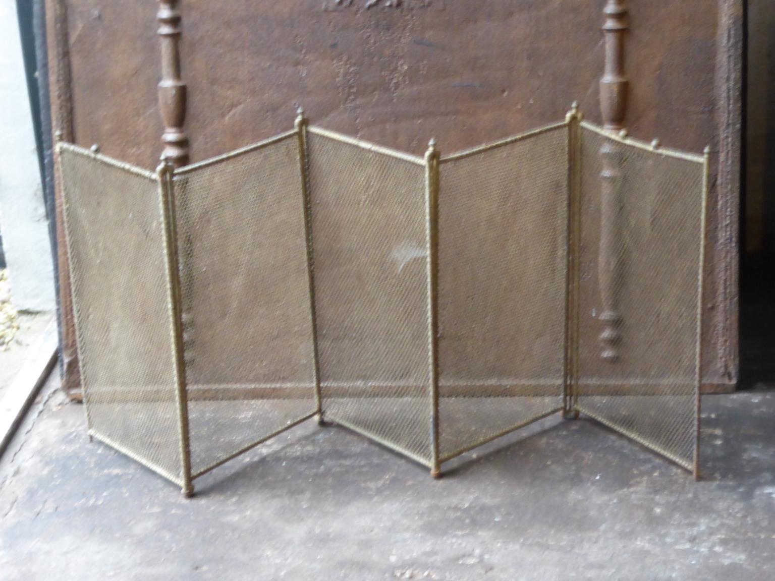 19th century French Napoleon III five-panel fireplace screen. The screen is made of iron and iron mesh. It is in a good condition and is fit for use in front of the fireplace.