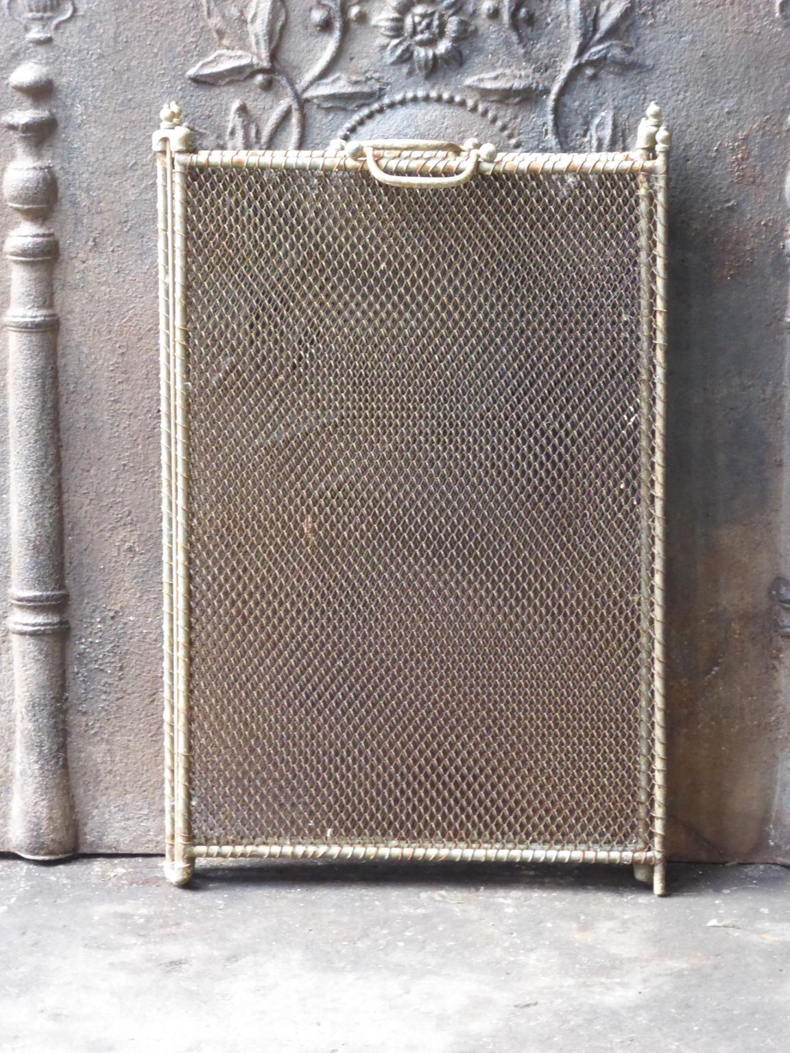 19th century French Napoleon III four-panel fireplace screen. The screen is made of iron and iron mesh. It is in a good condition and is fit for use in front of the fireplace.