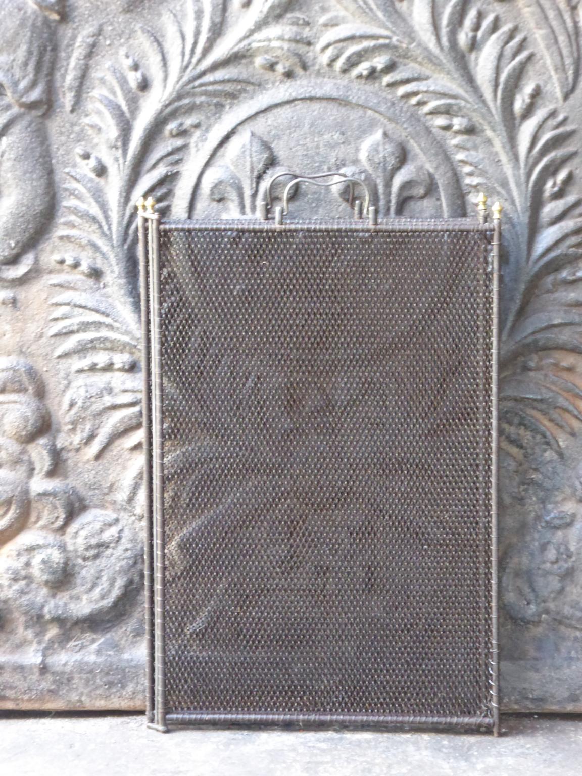 19th century French Napoleon III three-panel fireplace screen. The screen is made of brass and iron. It is in a good condition and is fit for use in front of the fireplace.