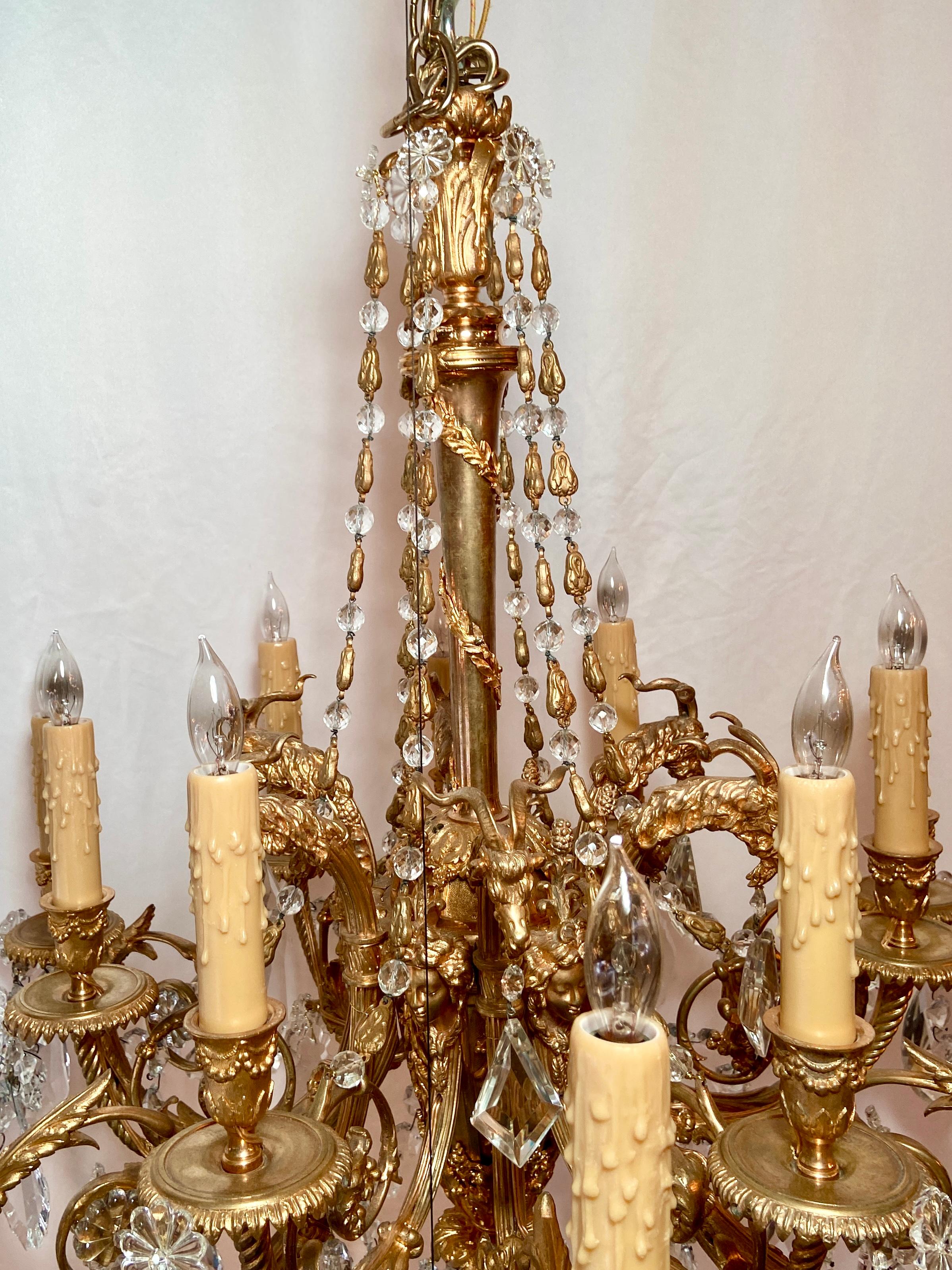 Exceptional antique French Napoleon III gold bronze and baccarat crystal chandelier, Circa 1880.