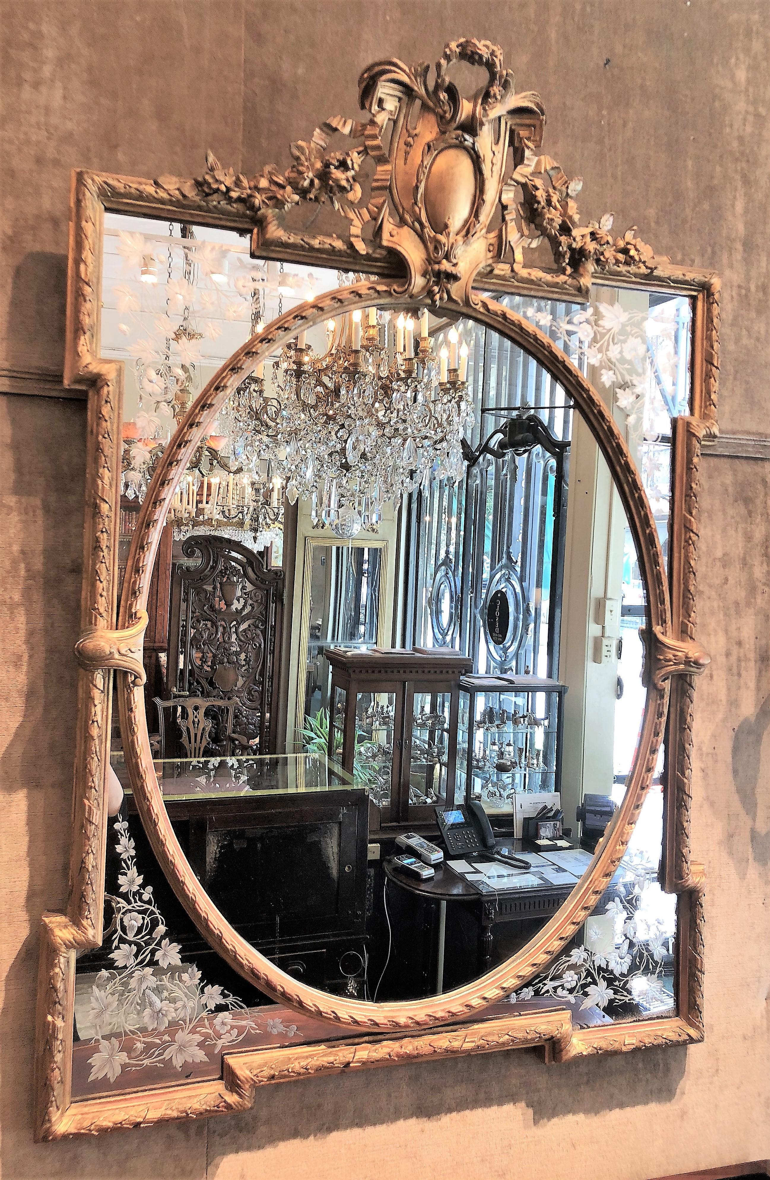 This mirror has its original silver and is finely etched.