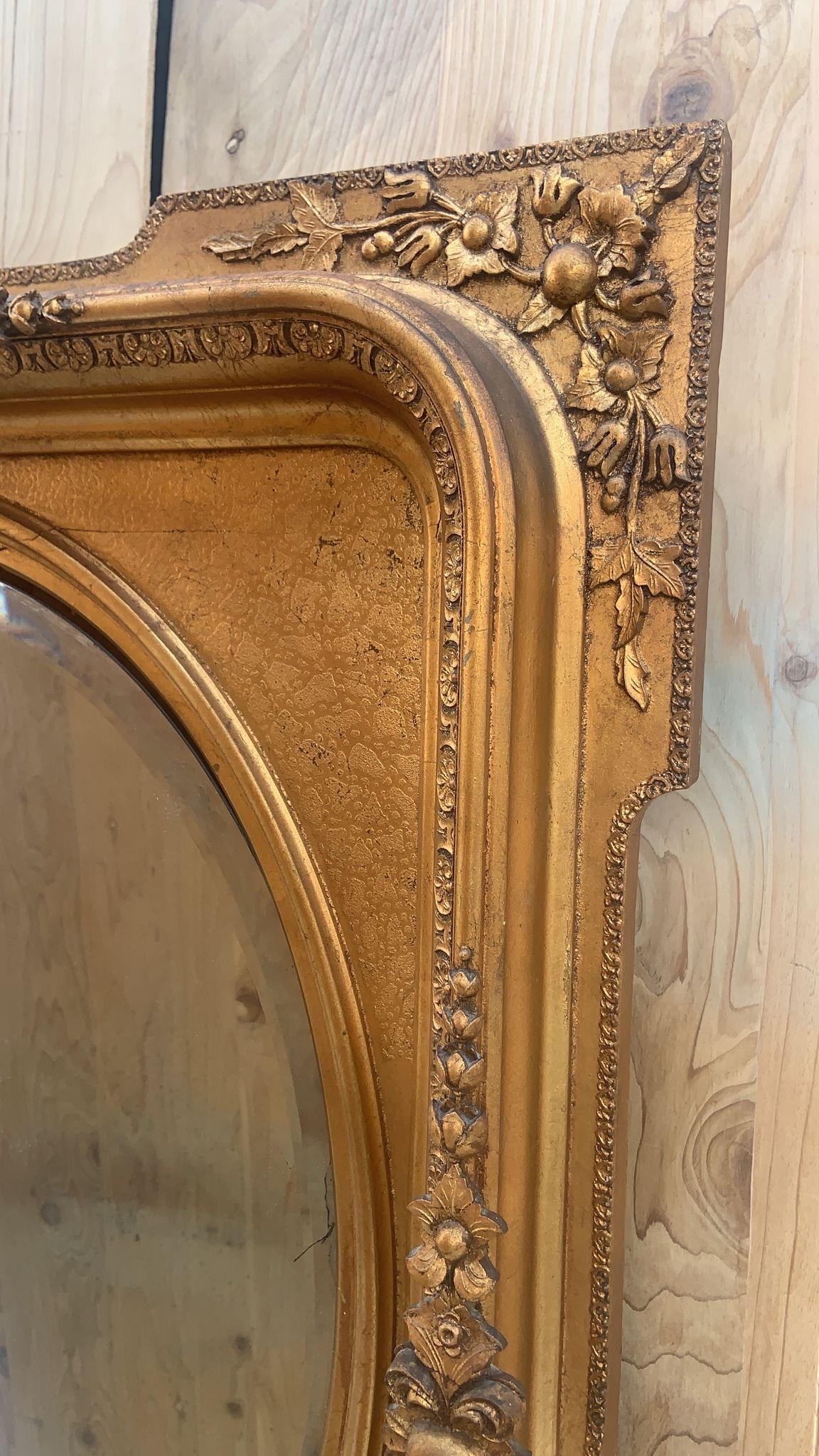 Hand-Carved Antique French Napoleon III Style Carved and Gilded Beveled Framed Wall Mirror For Sale