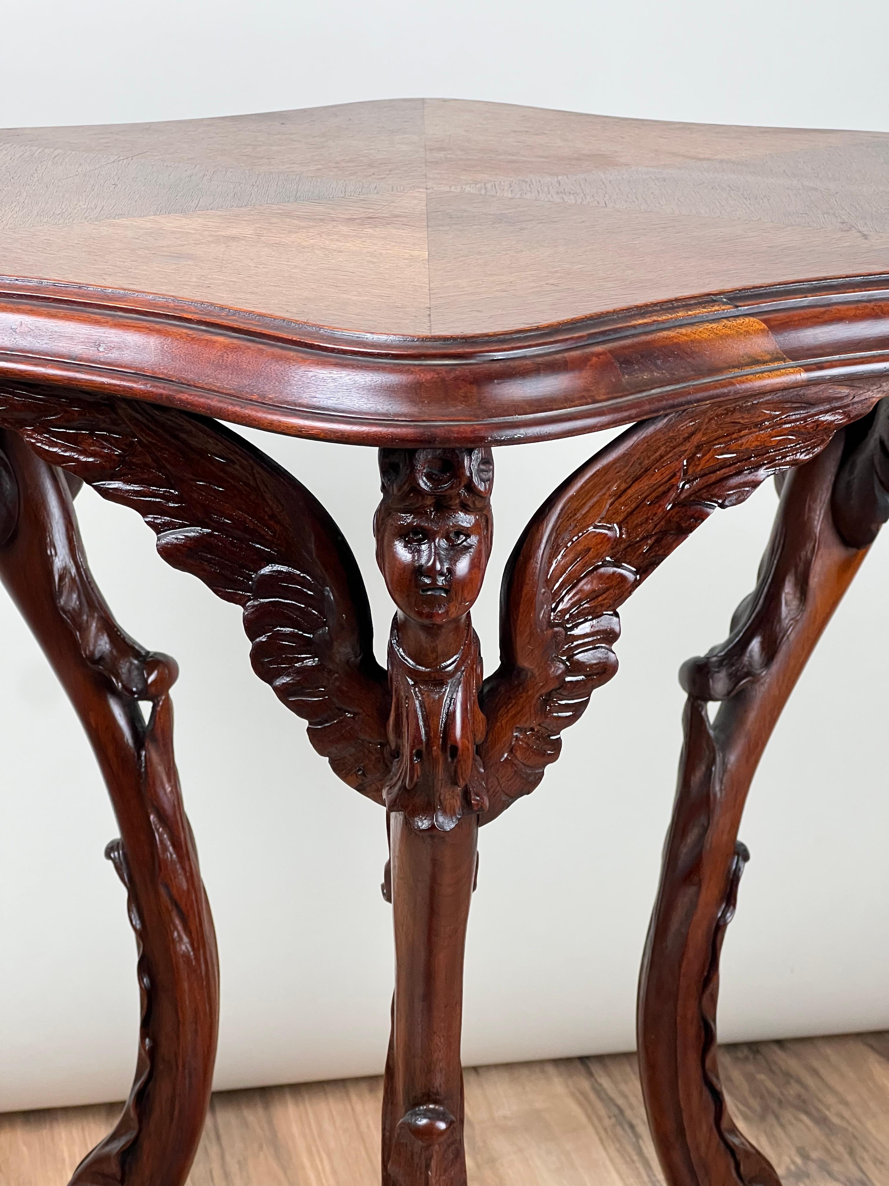 Fin du XIXe siècle Antiquity French Napoleon III Walnut Tri-leg with Carved Angel Shoulders c. 1870 en vente