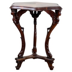 Antique French Napoleon III Walnut Tri-leg with Carved Angel Shoulders c. 1870