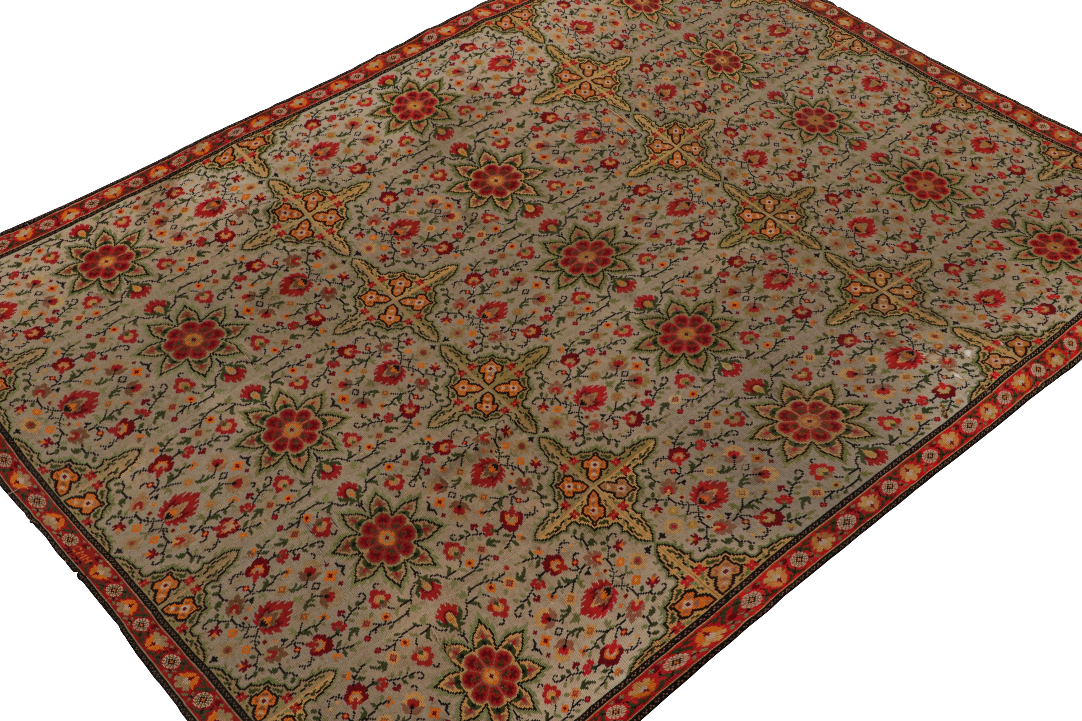 Handwoven in wool, circa 1920-1930, this 7x10 antique French Needlepoint rug, features a beige field with taupe notes, and floral patterns in red and green. 

On the Design: 

Connoisseurs will admire the movement and variation of floral patterns in