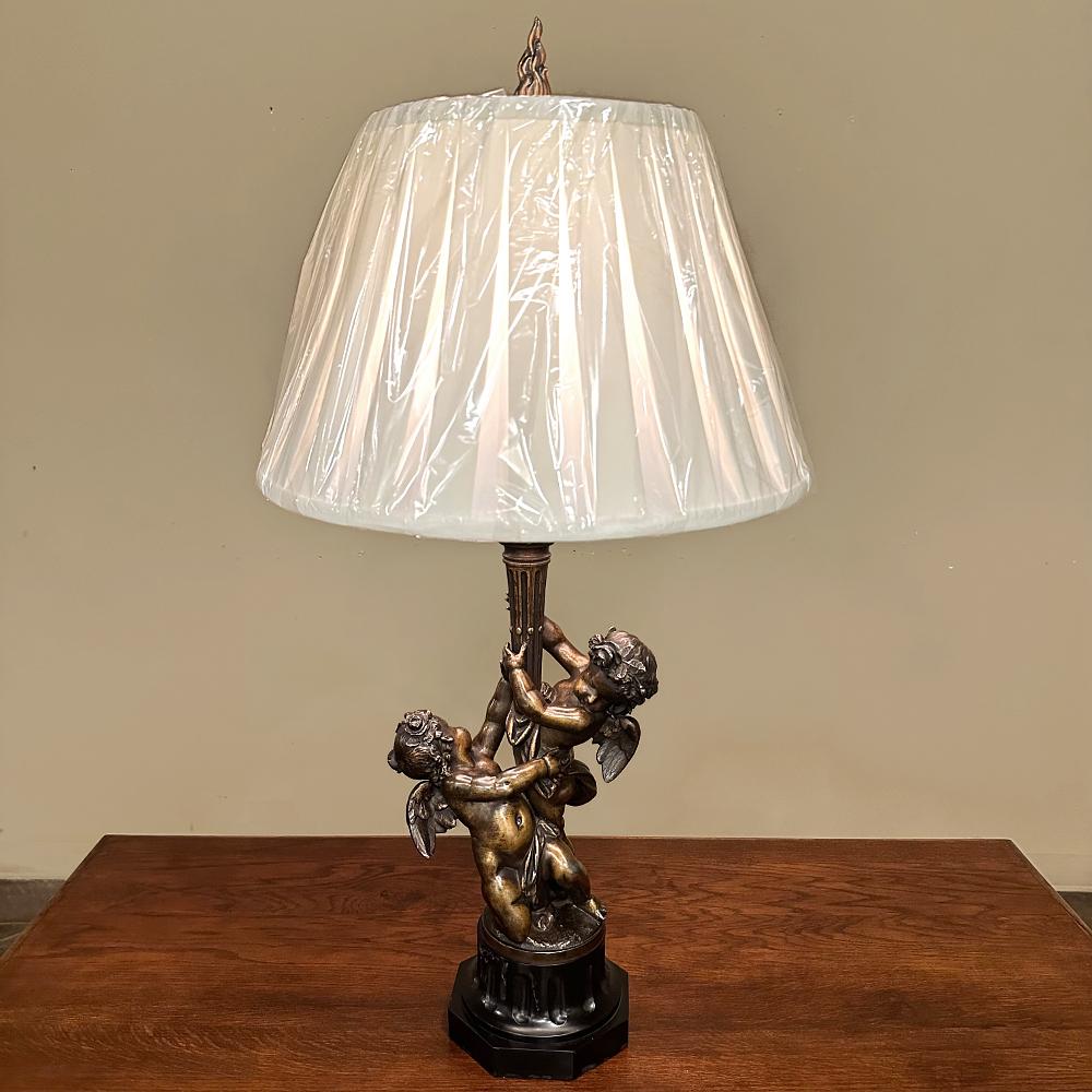 Antique French Neoclassical Cast Bronze & Slate Table Lamp with Silk Shade is a remarkable example of the splendor of the Romantic age, when classical architecture was revived in the spirit of Louis XVI and Marie Antoinette, to be enjoyed again by