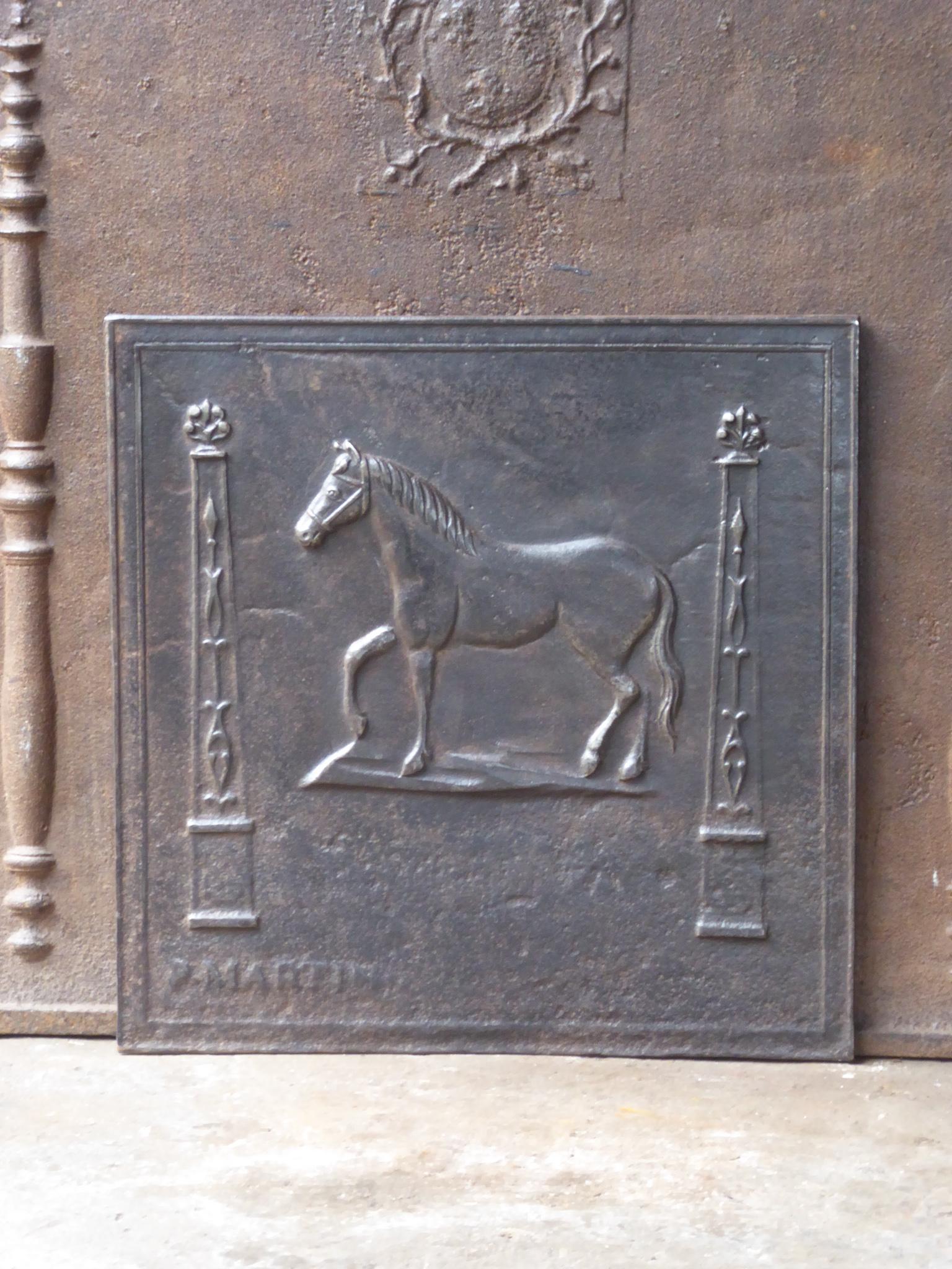 18th-19th Century French neoclassical fireback with a horse. 

The fireback is made of cast iron and has a natural brown patina. Upon request it can be made black / pewter at no extra cost. It is in a good condition and does not have