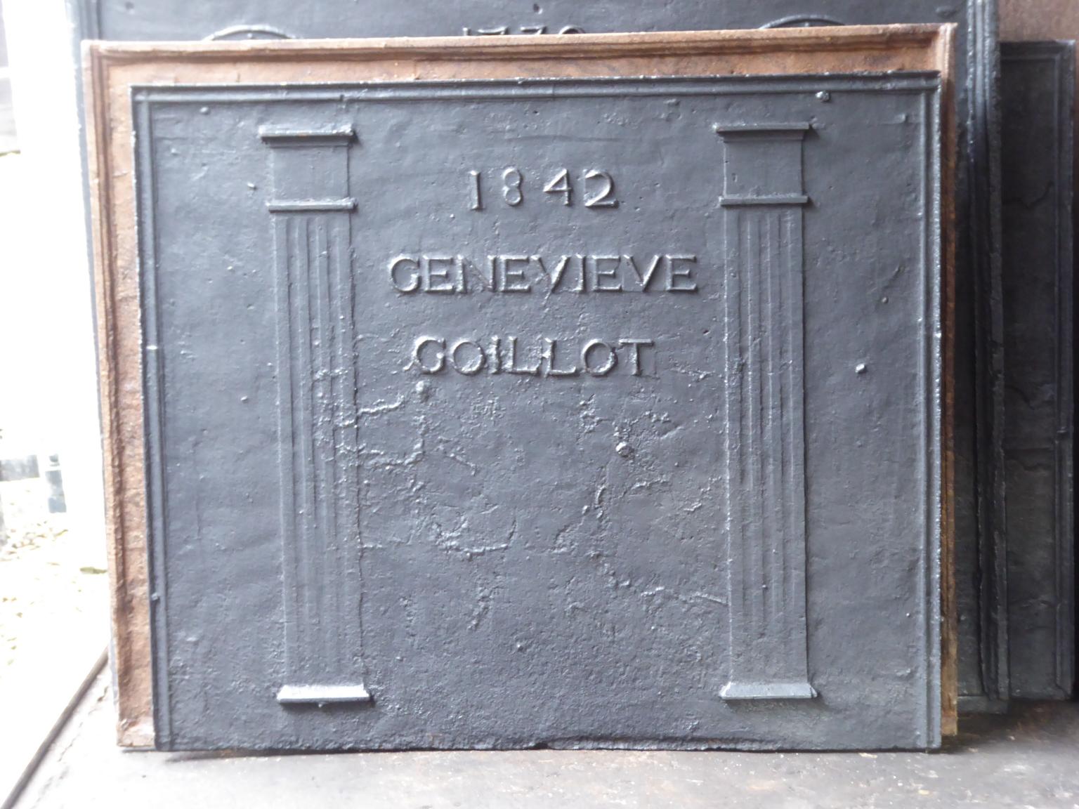 19th century French neoclassical fireback with two pillars of freedom. The pillars symbolize the value liberty, one of the three values of the French revolution. The date of production of the fireback, 1842, is also cast in the fireback

The