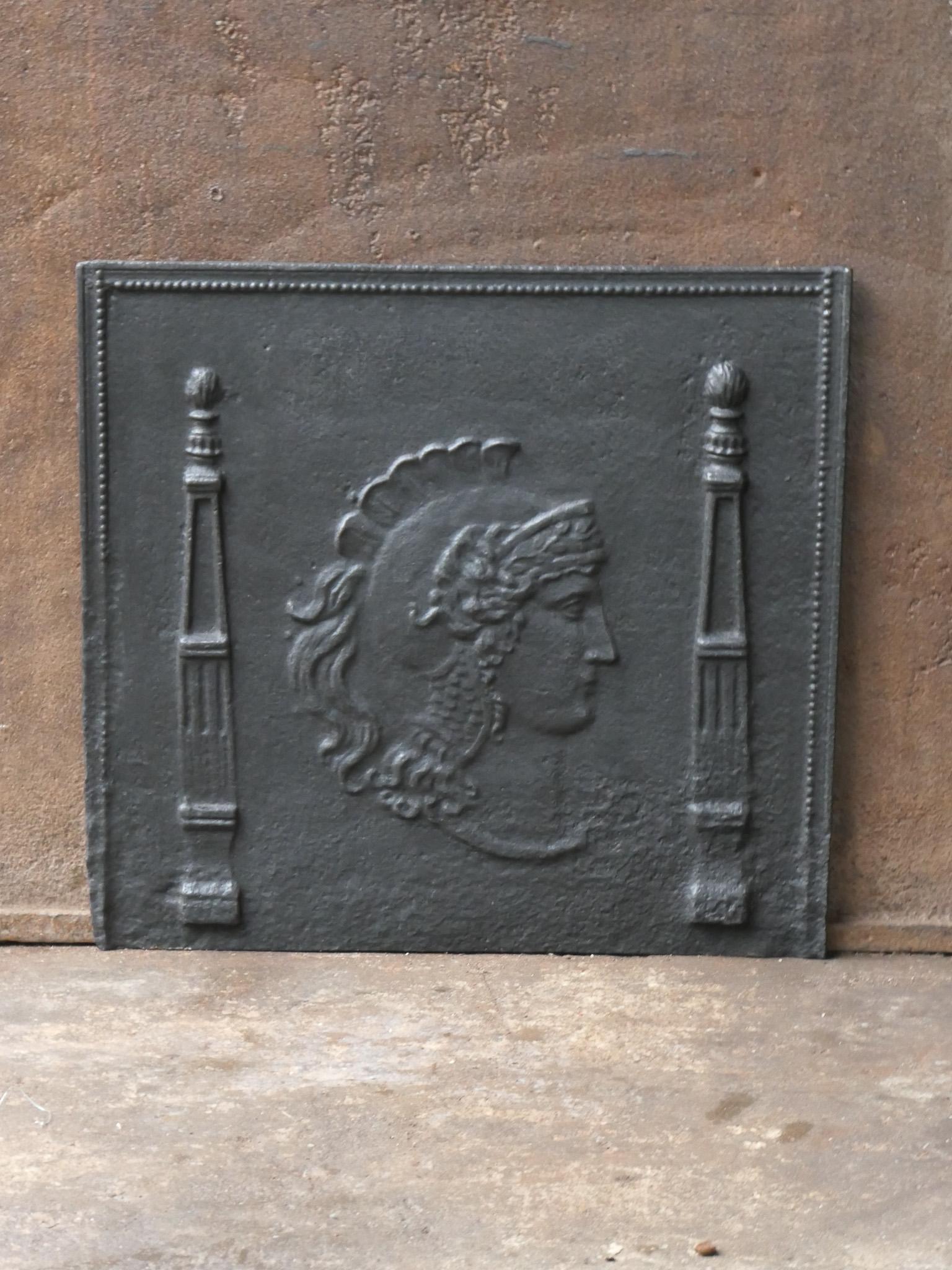 Beautiful 18th/19th century French Neoclassical fireback with a Roman Soldier and two pillars. 

The fireback is made of cast iron and has a black patina. It is in a good condition and does not have cracks.