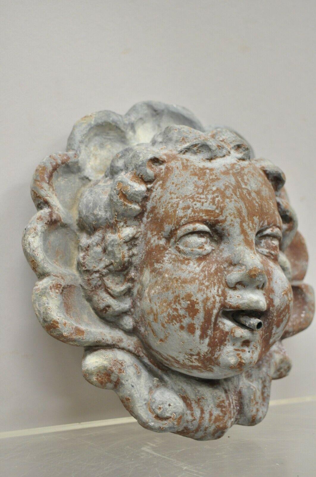 Antique French Neoclassical Small Lead Cherub Head Garden Wall Fountain. Item features a nicely cast lead form, wonderful detail and patina, very nice item, great style and form, approx. 10lbs. Circa Early to Mid 20th Century. Measurements: 9