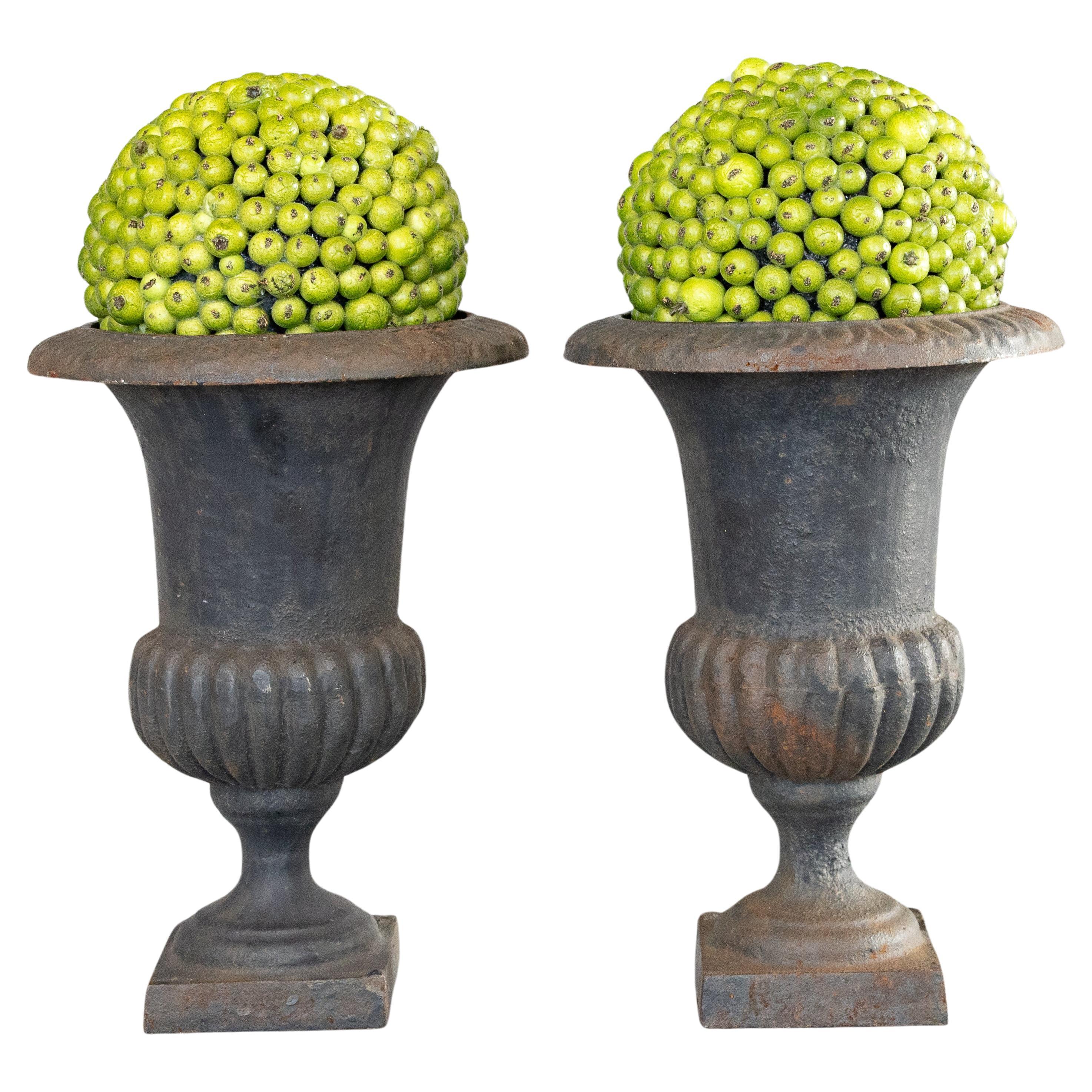 Pair of Early 20th Century Petite French Neoclassical Style Cast Iron Urns