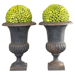 Pair of Early 20th Century Petite French Neoclassical Style Cast Iron Urns