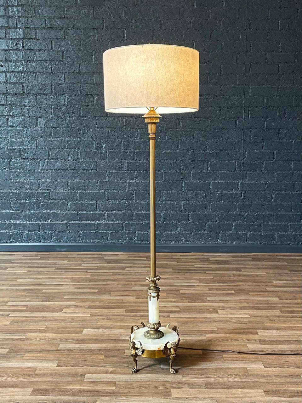 Condition: Newly Rewired, New Linen Shades
Materials: Gilt Bronze, Onyx Stone, New Custom Linen Shades
Style: French Neoclassical 

Dimensions:
60.50”H x 11.50”W x 11.50”D
Shade:
10