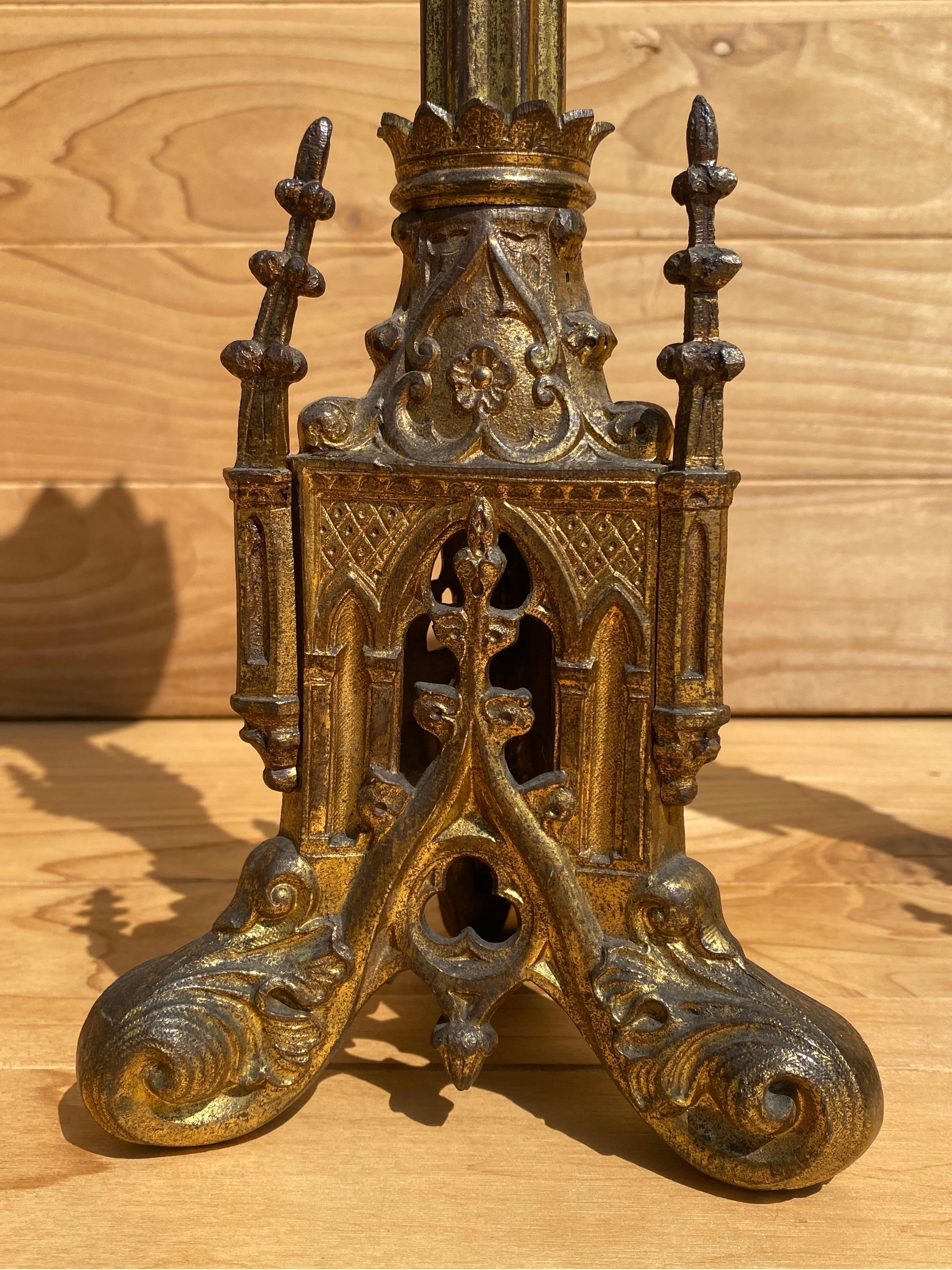 Antique French Neogothic Altar Torchère Candlestick Set w/ Architectural Elements & Patina

Decorate your mantlepiece, altar, church, or chapel with these large ornate candlesticks. The candlesticks have convenient plates to catch the hot wax of the