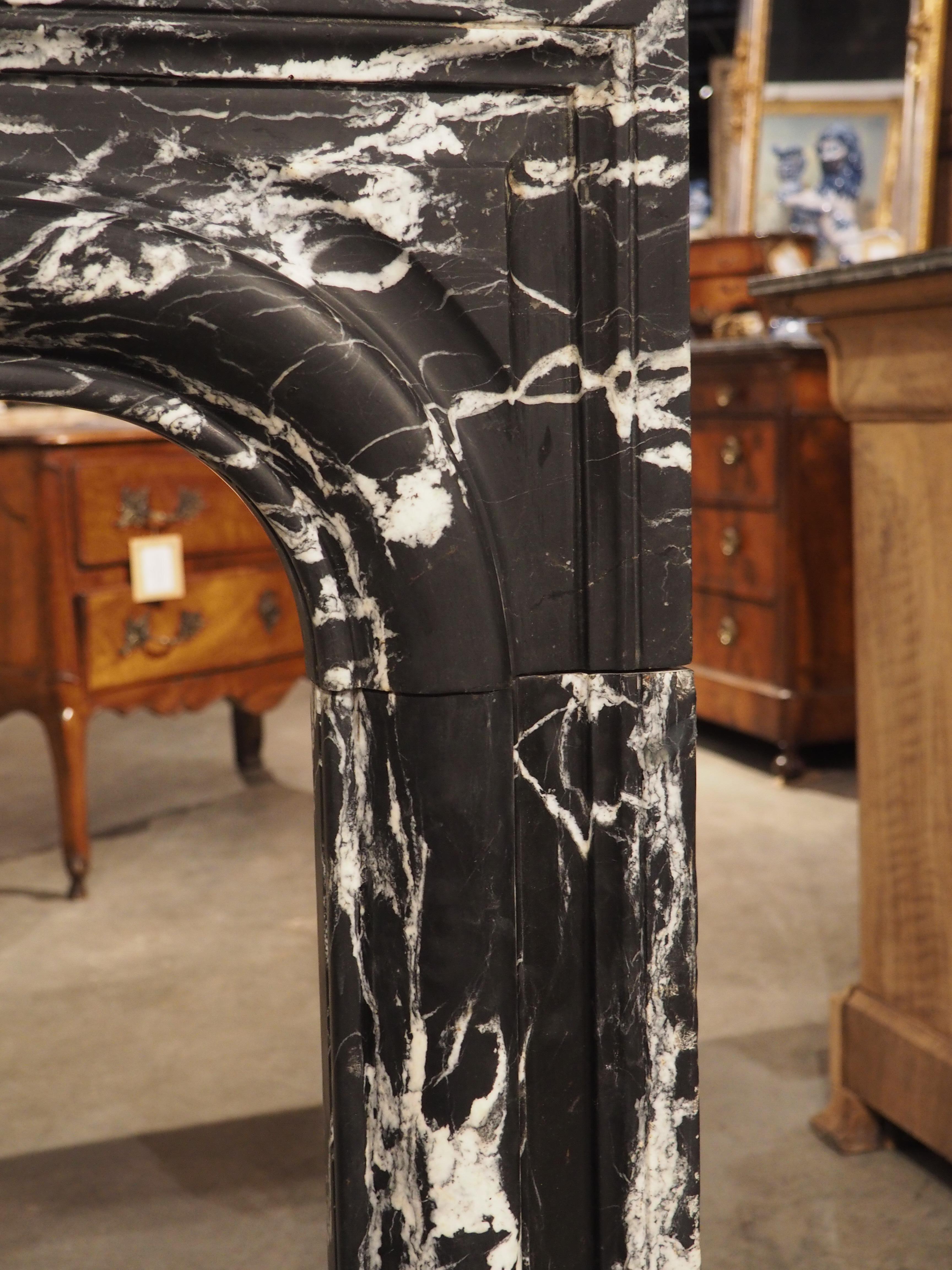 Hand-Carved Antique French Nero Marquina Marble Fireplace Mantel, Circa 1880 For Sale