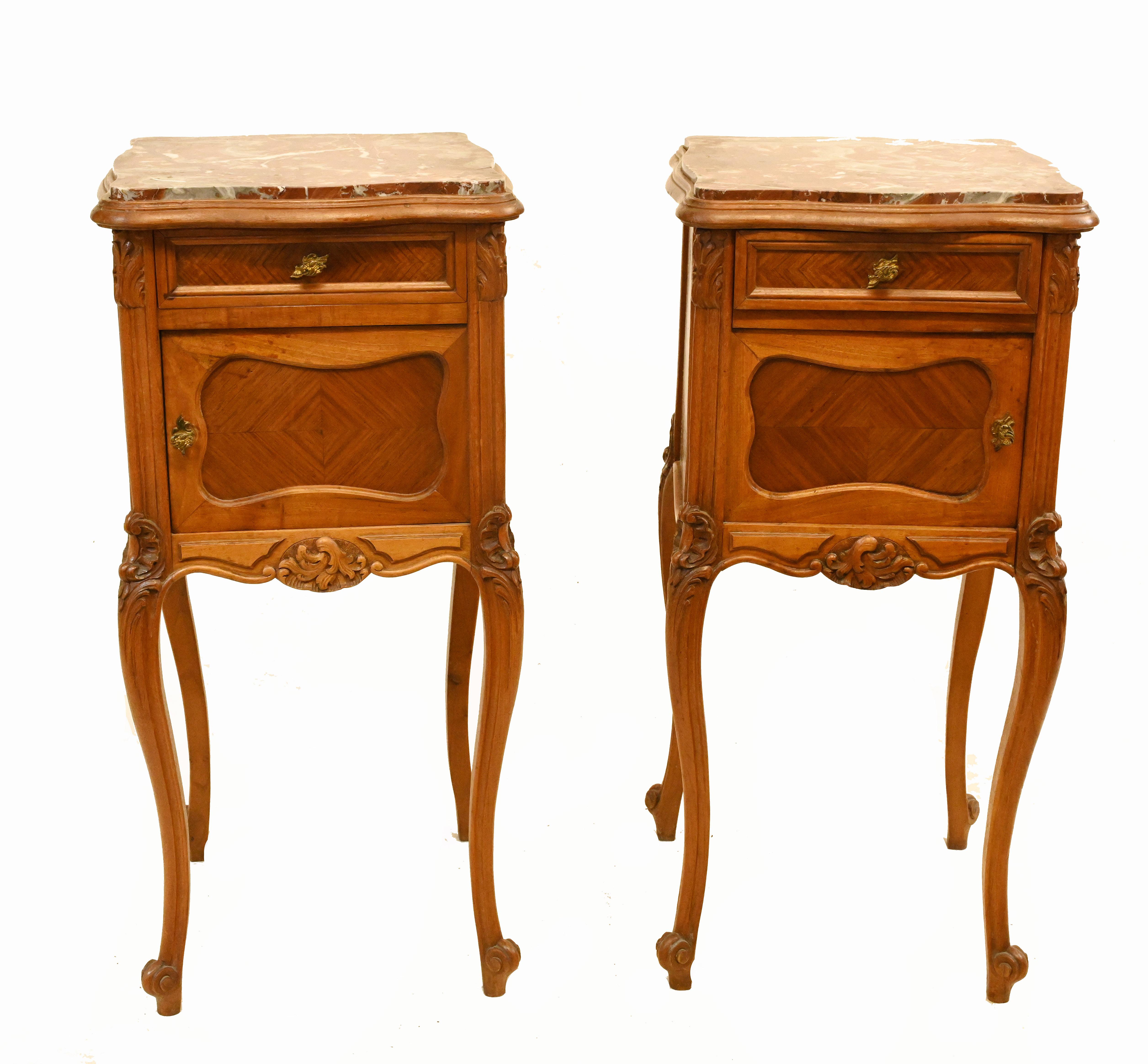 Cute pair of antique French bedside chests 
We date to circa 1900 and they are in walnut with marble tops
Great find on the Marche Biron at the Paris antiques markets
Viewing by appointment
Offered in great shape ready for home use right
