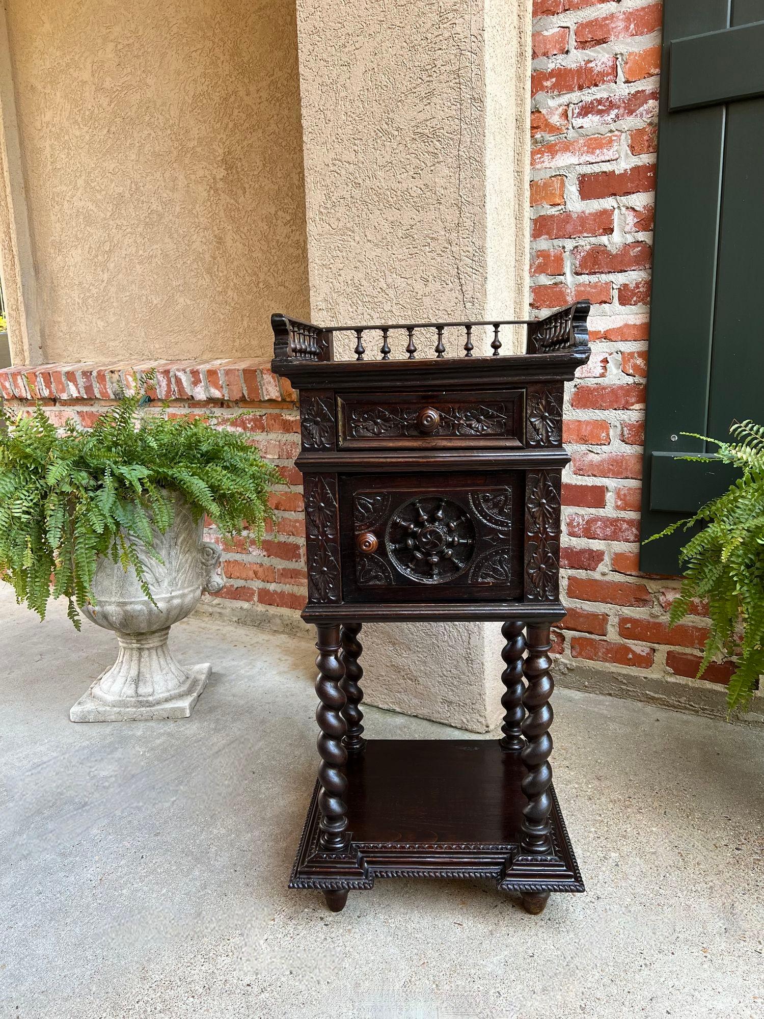 Antique French Nightstand Table Cabinet Brittany Breton Marble Barley Twist.

Direct from the Brittany region of France, a very ornate Breton carved nightstand cabinet or end table.
The gorgeous cabinet has lavish hand carvings throughout (on all 3