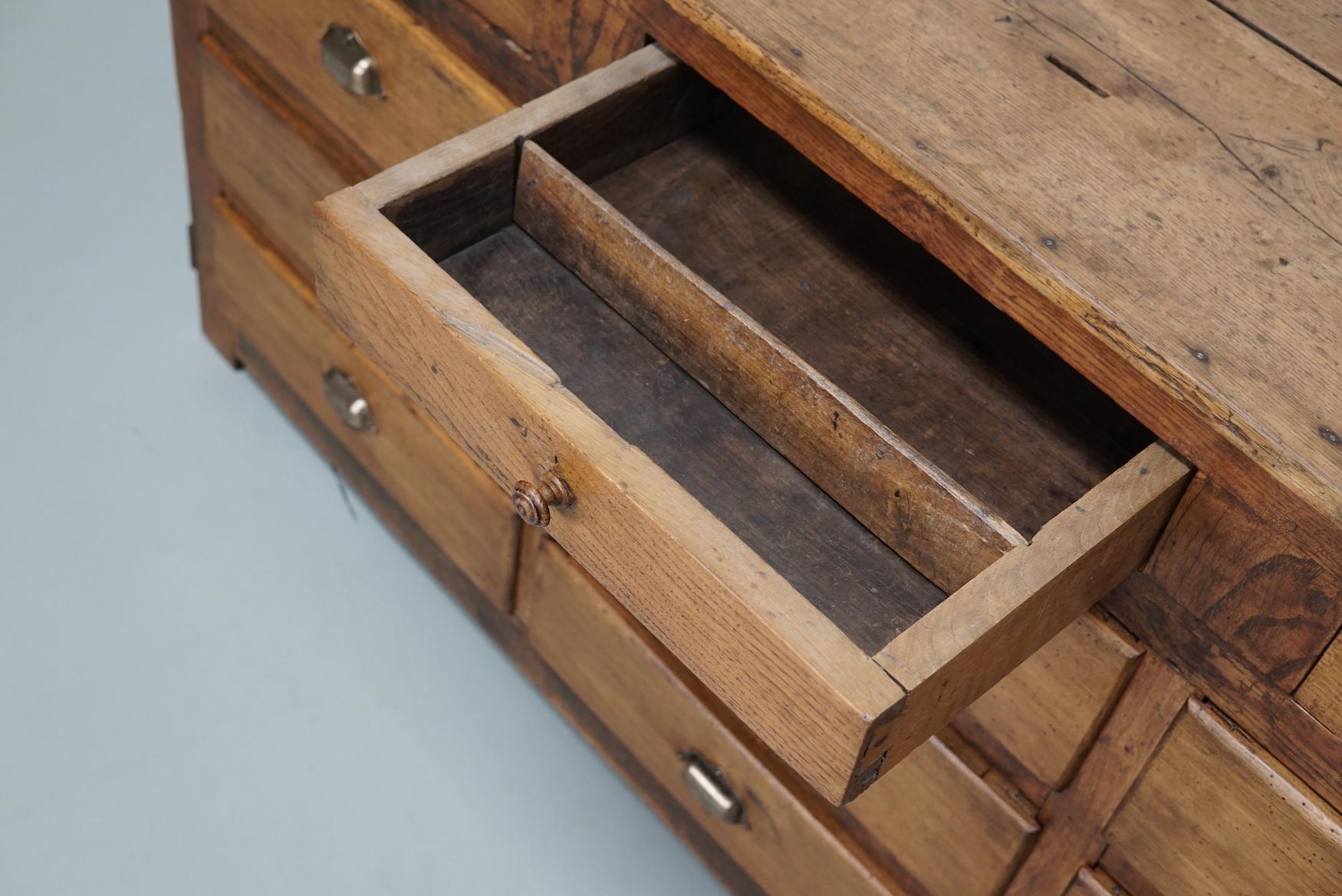 Antique French Oak and Beech Rustic Bank of Apothecary Drawers, Circa 1910 For Sale 8