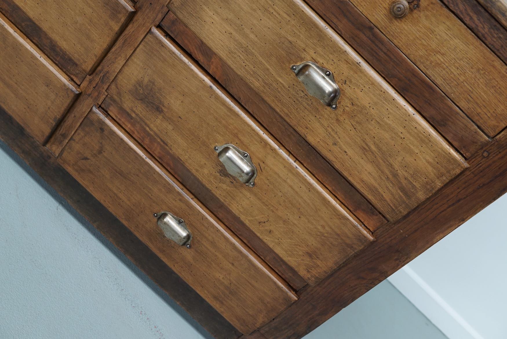 Antique French Oak and Beech Rustic Bank of Apothecary Drawers, Circa 1910 For Sale 11