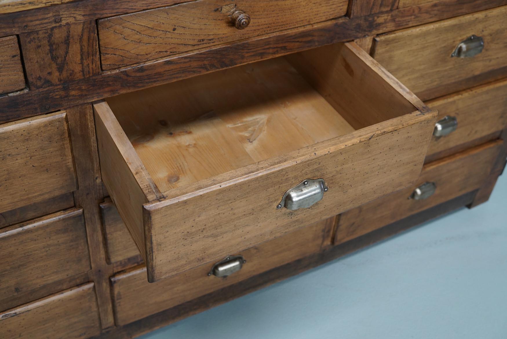 Antique French Oak and Beech Rustic Bank of Apothecary Drawers, Circa 1910 For Sale 13