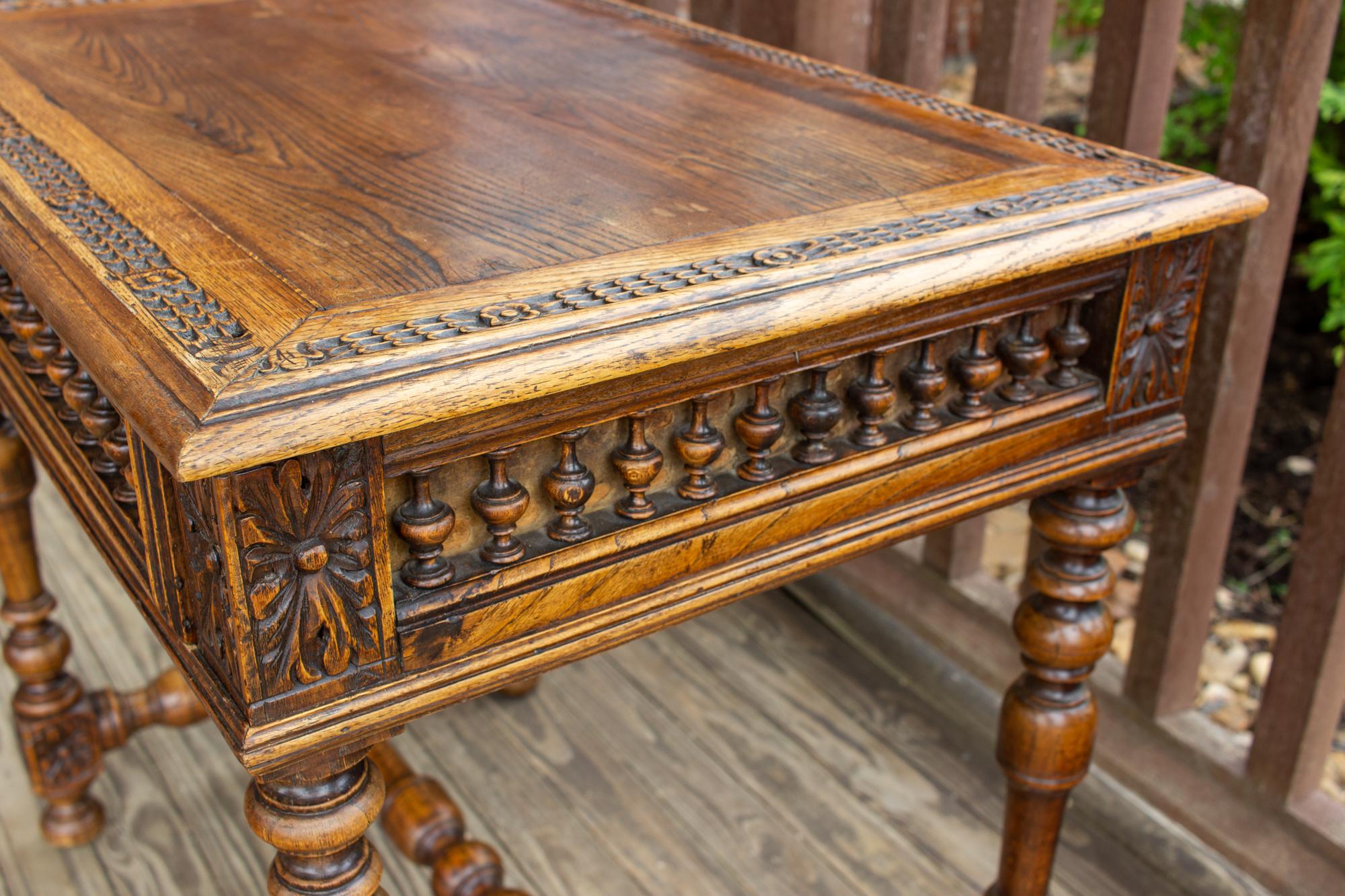 20th Century Antique French Oak Carved Gothic Style Writing Desk with Drawer & Iron Hardware