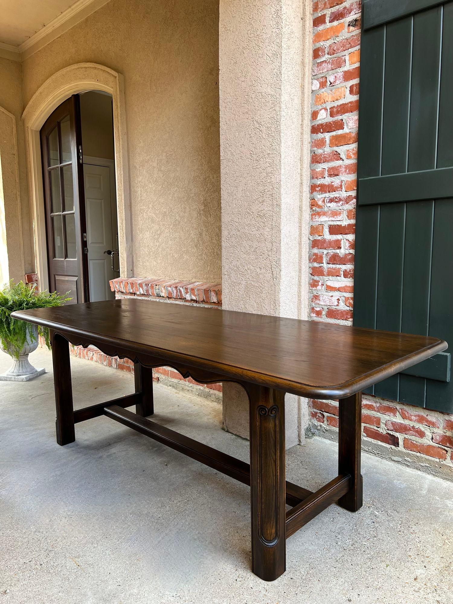 Antique French Oak Dining Farm Table Conference Office Desk LARGE 7 ft.

Direct from France, a gorgeous antique French carved oak dining table or conference/library table in a large 87” (over 7 ft)! These tables are one of our most requested