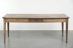 Antique French oak dining table for 6 to 8 people with a baguette drawer