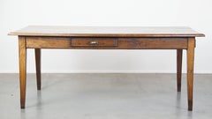 Antique French Oak Dining Table from the Early 19th Century with 2 Drawers