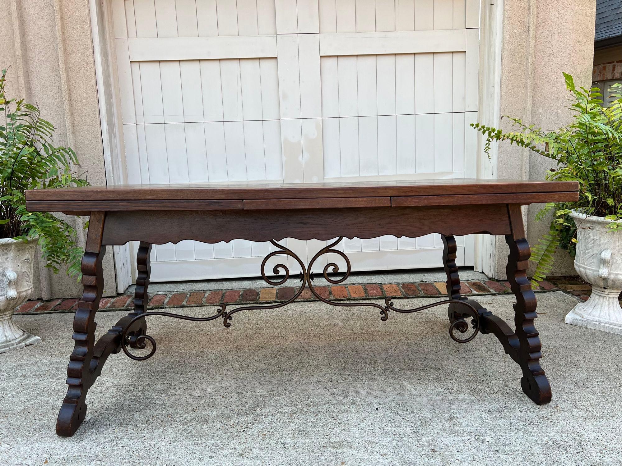Antique French Oak Dining Table Spanish Catalan Trestle 9 FT. Draw Leaf c1910.

Direct from France, and quite the rare find, a substantial Catalan style table, yet with draw leaves that extend it to a HUGE 9.5 ft. length!! The table features