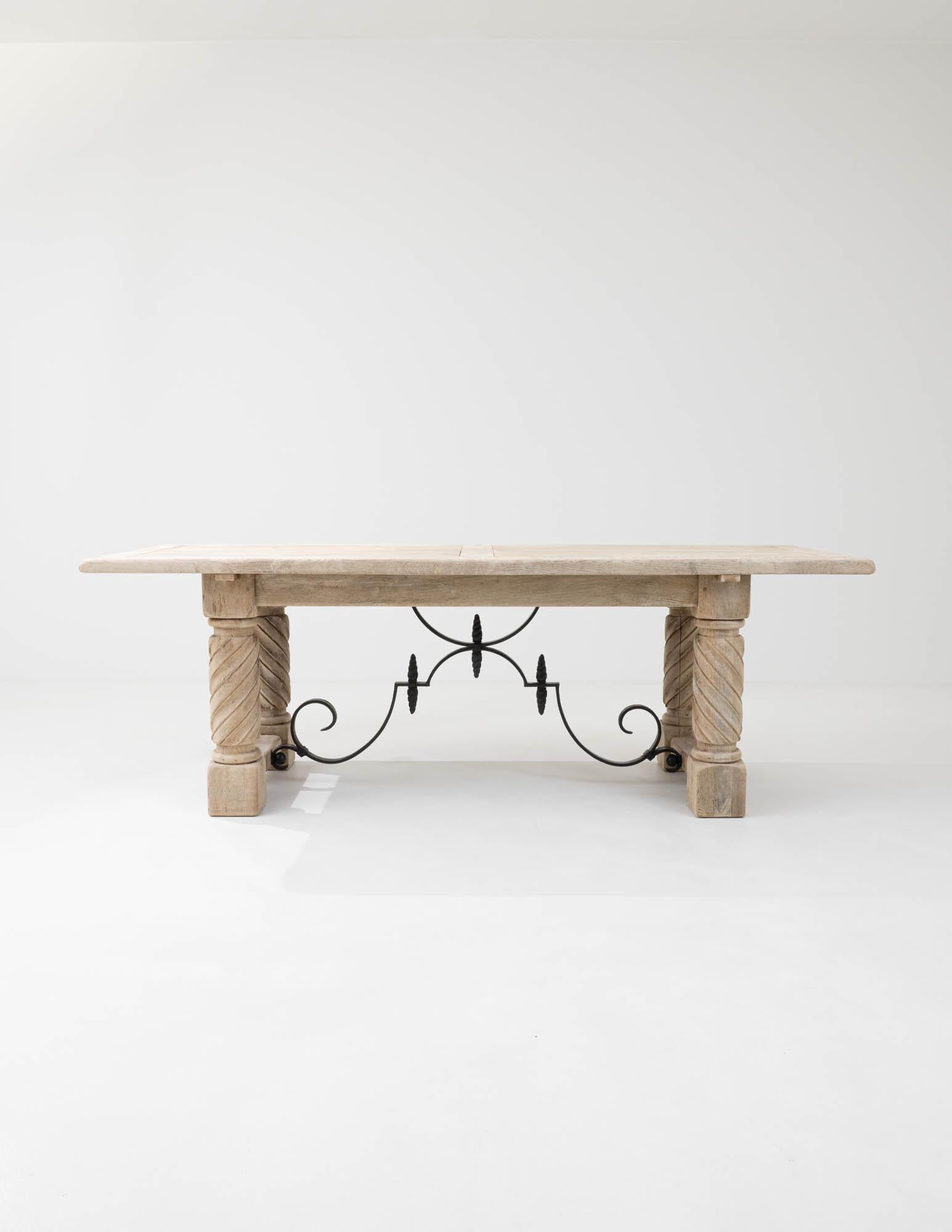 Philosopher Walter Benjamin described iron, steel, and glass as the signs of modernity and the march of progress as he witnessed the fin-de-siecle in Paris. This table, coming from early twentieth-century France is made of bleached oak with