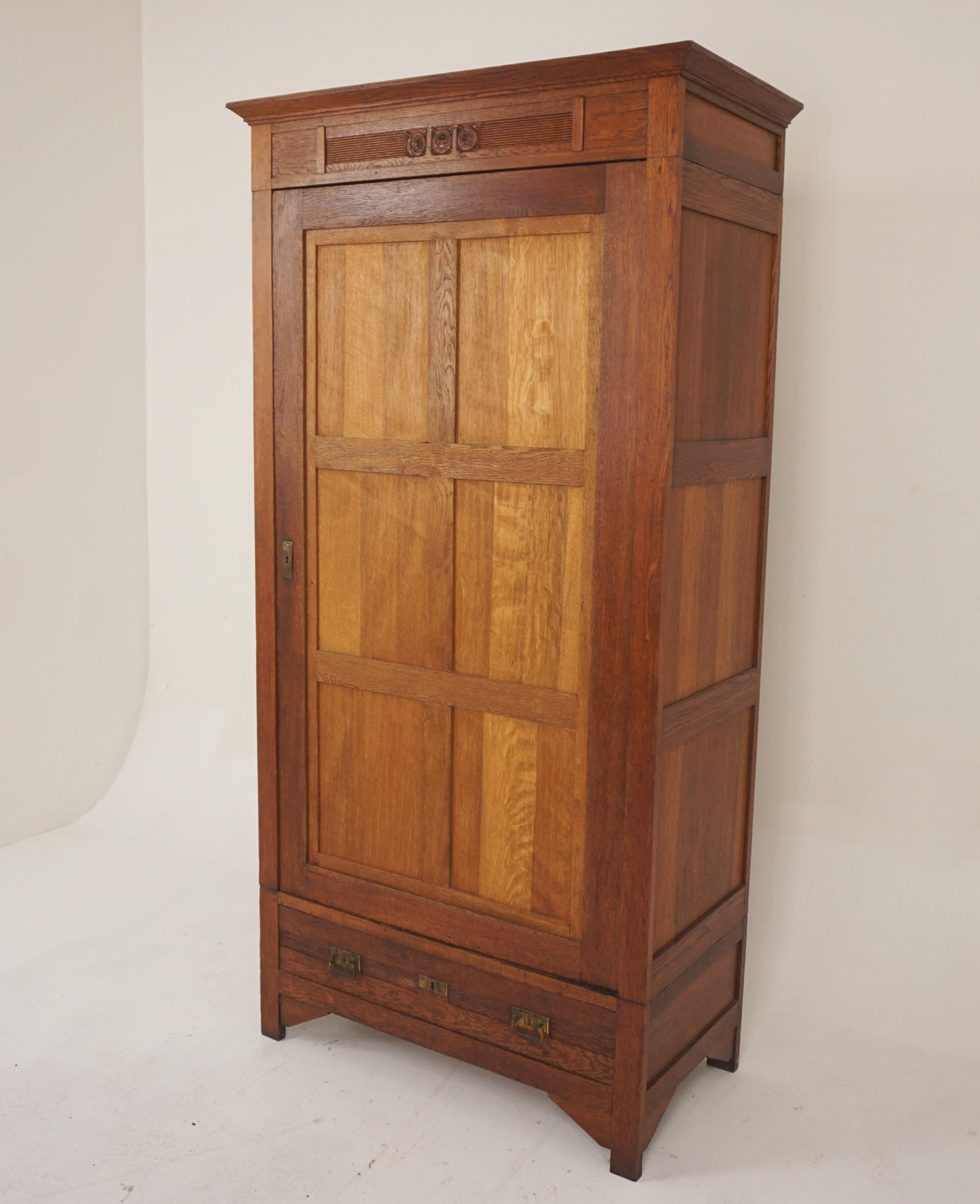 Antique French Oak Hall Robe, Wardrobe, Closet, Cupboard Arts & Craft. France 1910, H1199 

France 1910
Solid Oak
Original finish
Moulded cornice with carved front
Single six paneled oak door
Opens to reveal two loose shelves
Single drawer below