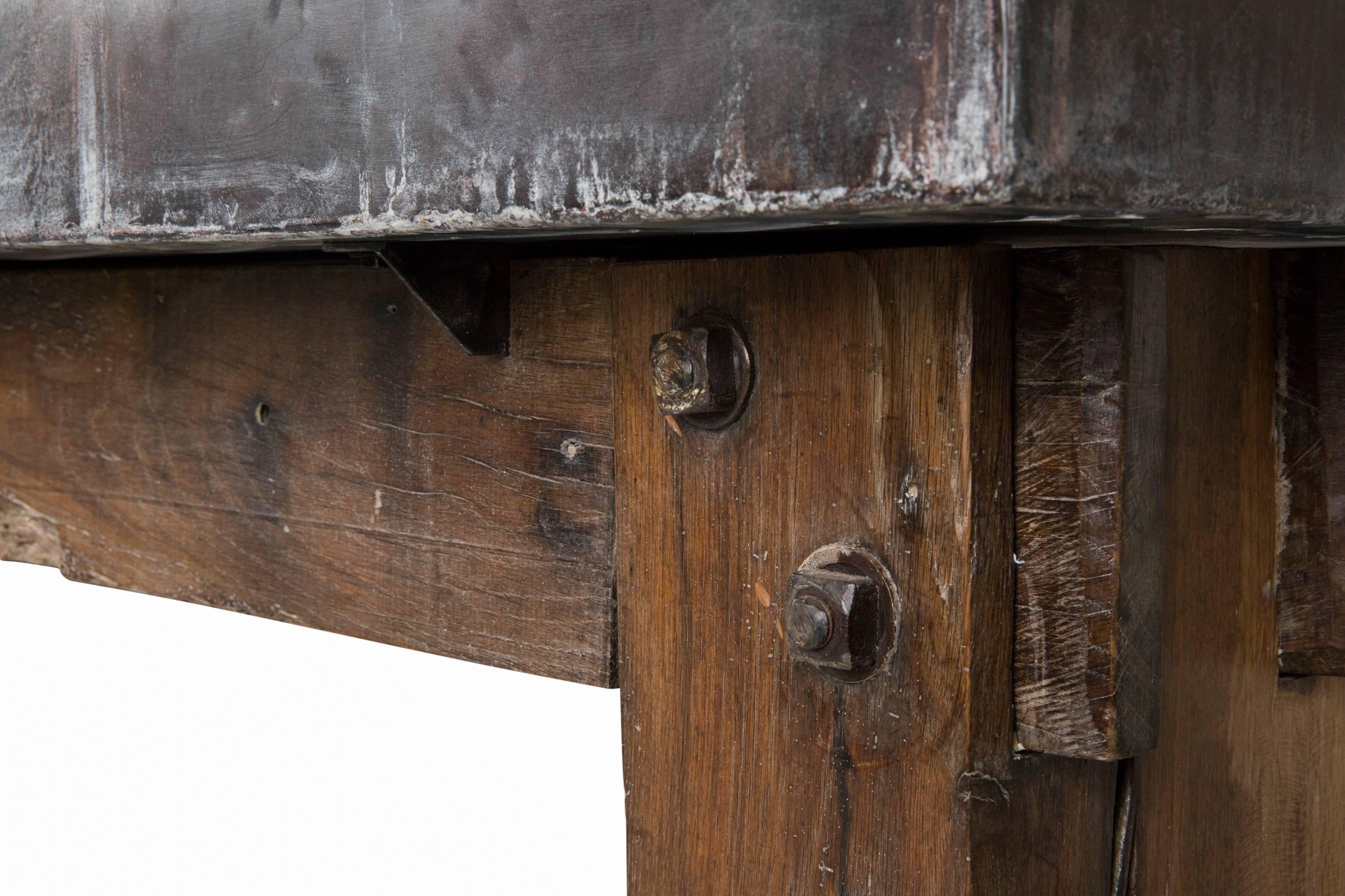 Antique French oak machinist's table with zinc top.
