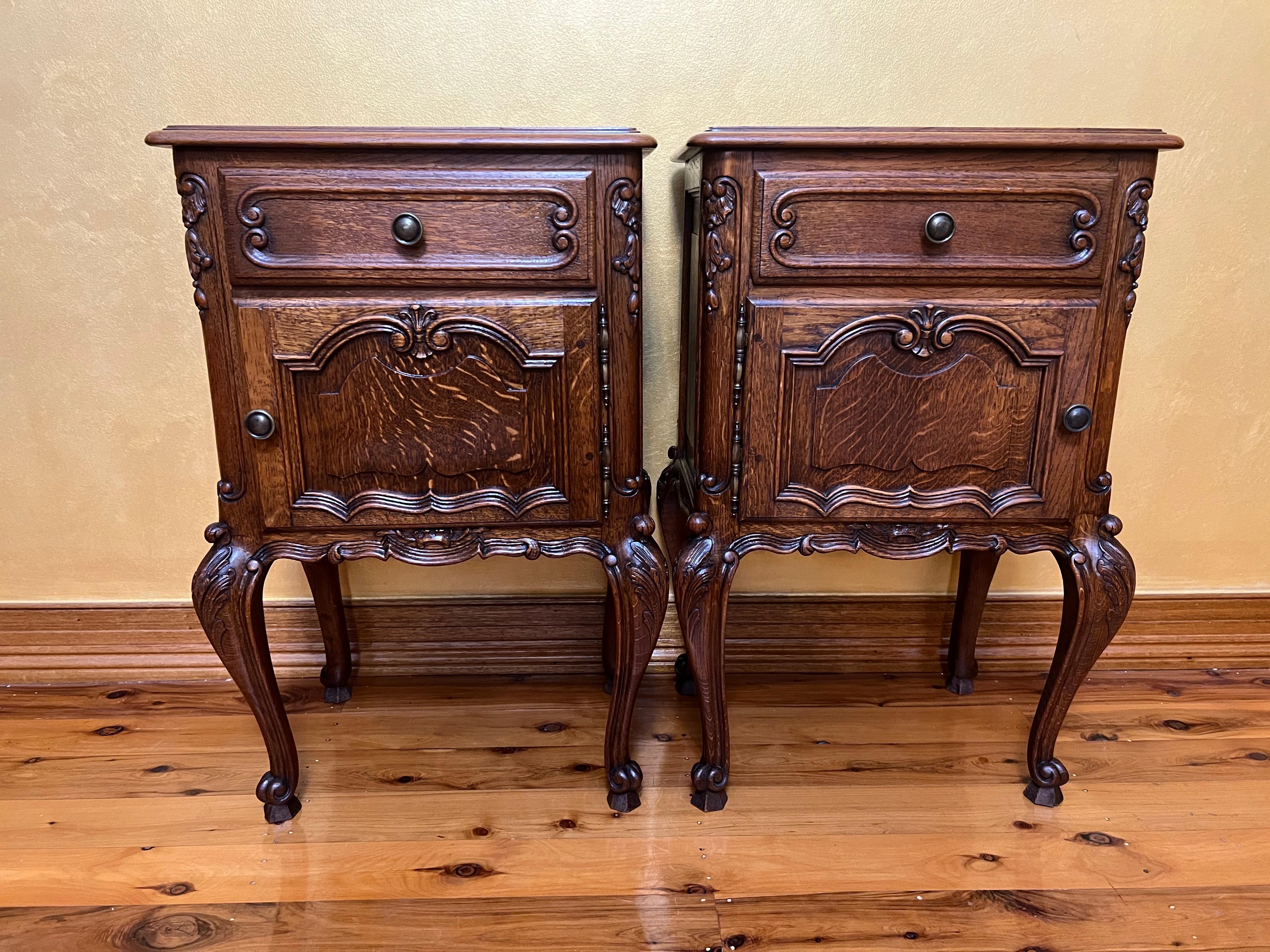 French oak very rare bedside tables, one drawer and open door cupboard on each, carvings on legs, drawer, cupboard with brass knobs, turned legs.

Circa: 1860

Material: Oak

Country of Origin: France

Measurements: 71cm high, 33cm width,