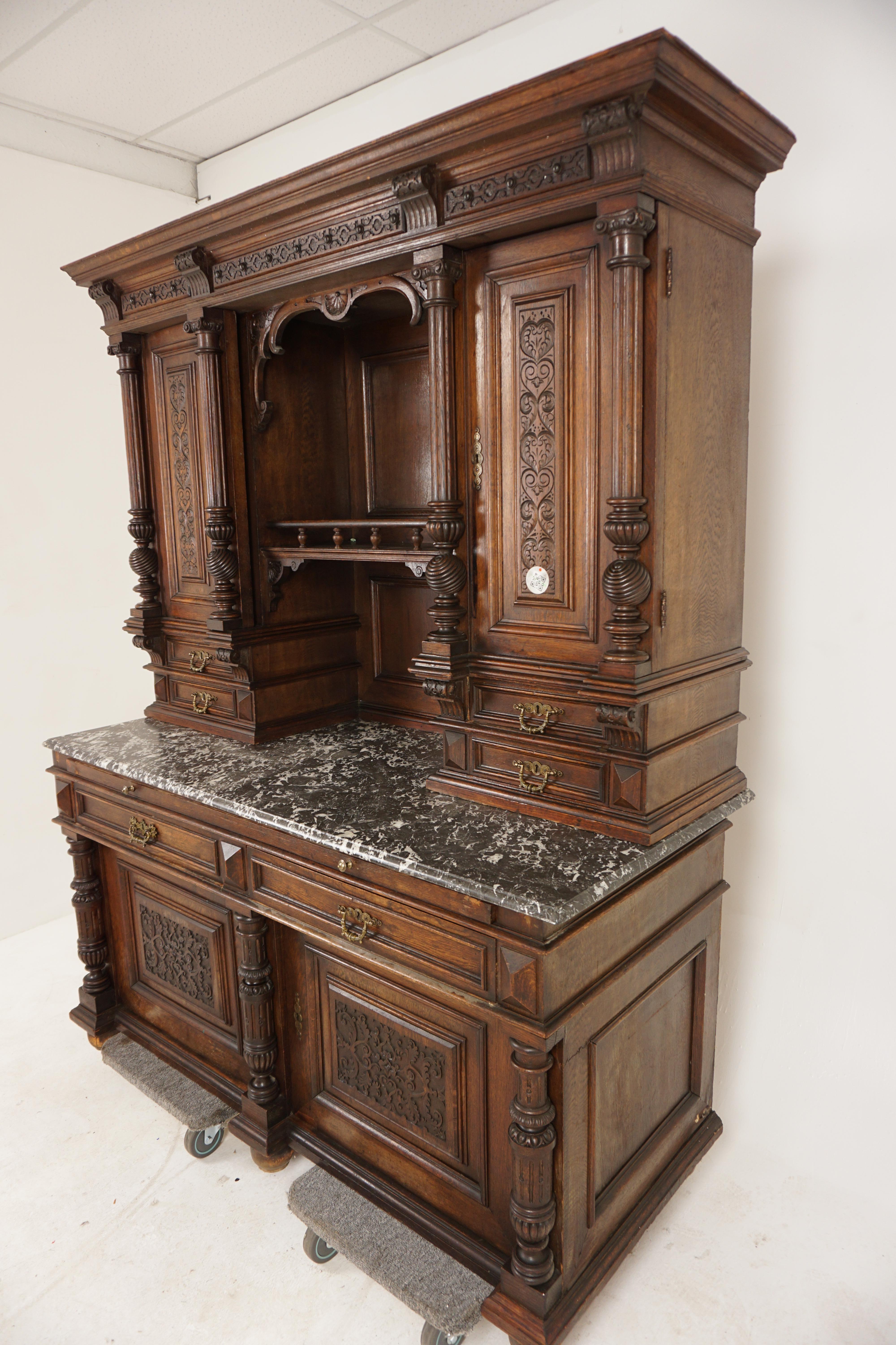 Antique French Oak Renaissance Buffet Hutch, Cabinet, Sideboard, France 1900, H646

France 1900
Solid Oak
Original finish
Large overhanging cornice
Open central shelf
Flanked by a pair of carved panelled doors which open to reveal single interior