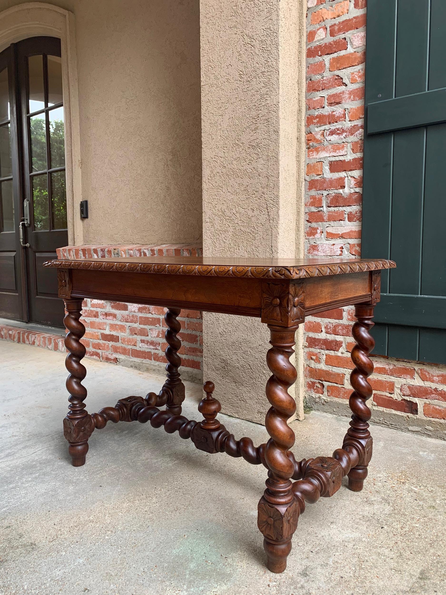 ~Direct from France~
~Beautiful French writing desk or sofa table with elegant features!~
~Lovely barely twist legs as well as barley twist stretcher and cross stretcher (always a sign of quality) with carved block joints~
~Huge center finial on the