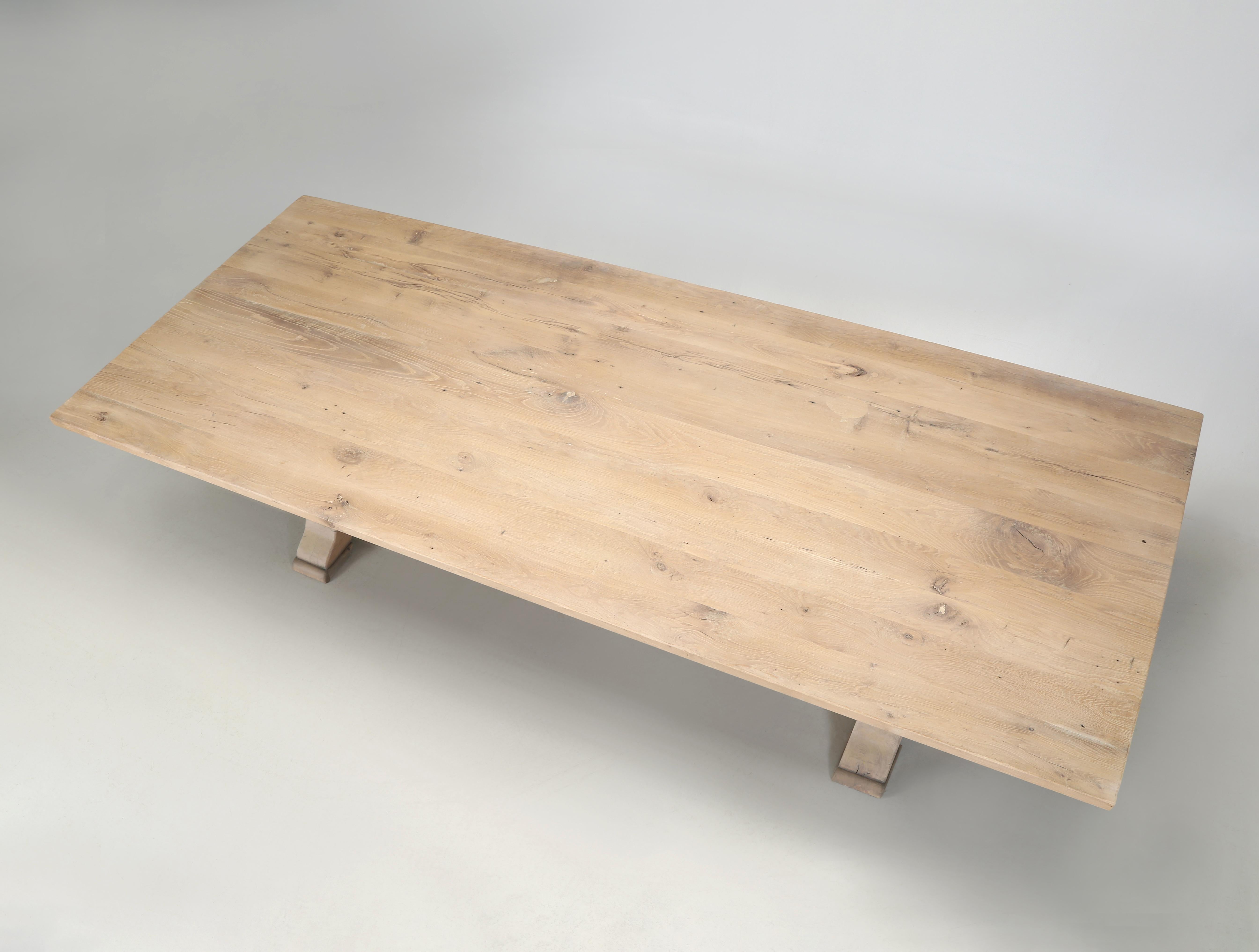 Antique French Trestle Style Dining Table that has been extensively restored by our inhouse Old Plank restoration department. Our Old Plank craftsmen set about doing a complete disassembly of the Antique French Farm Table and rebuilt each component