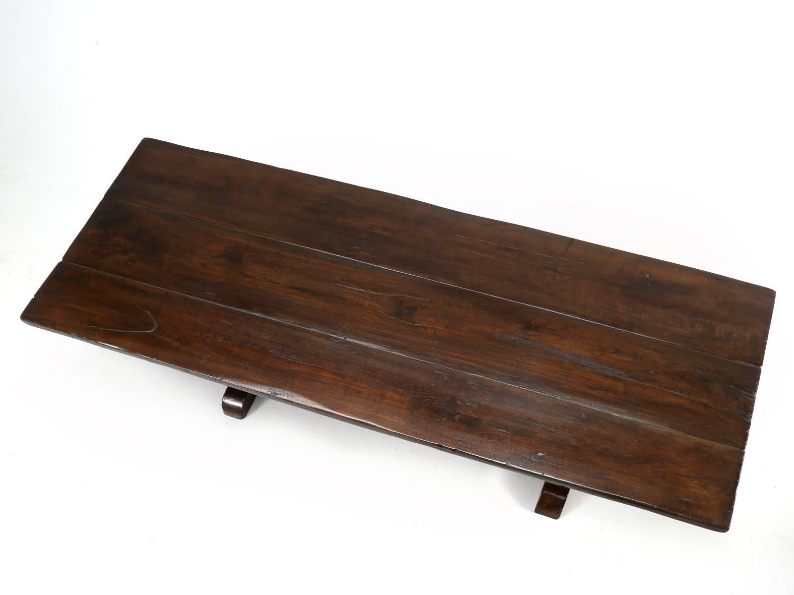 Antique French oak farm table, probably made in the early 1900s, although it is almost impossible to date a farm table accurately. This antique French oak farm table’s top, is made up of only three wide planks of oak and that usually is a good