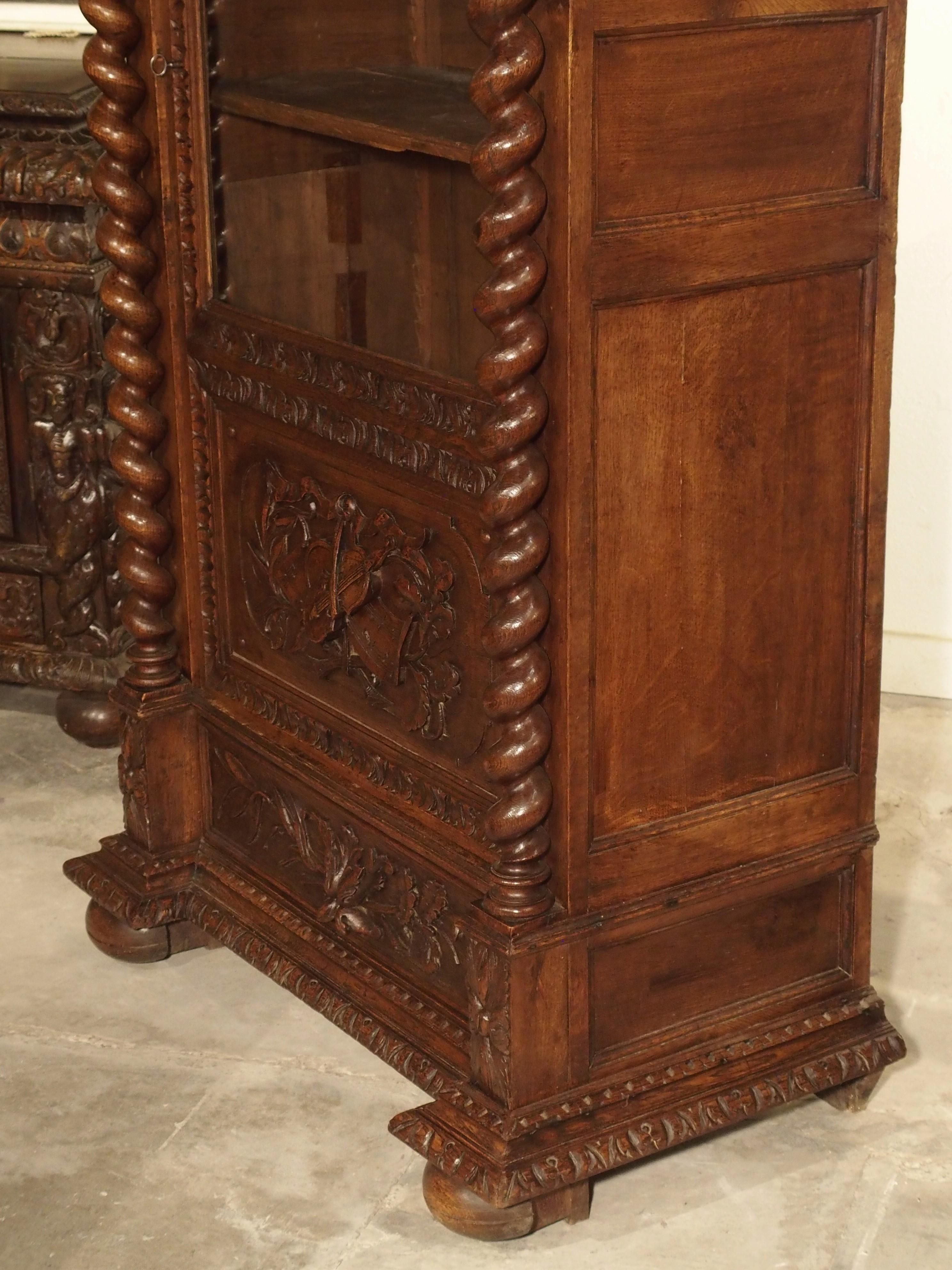 Antique French Oak Vitrine with Musical Carvings and Turned Columns, circa 1890 10