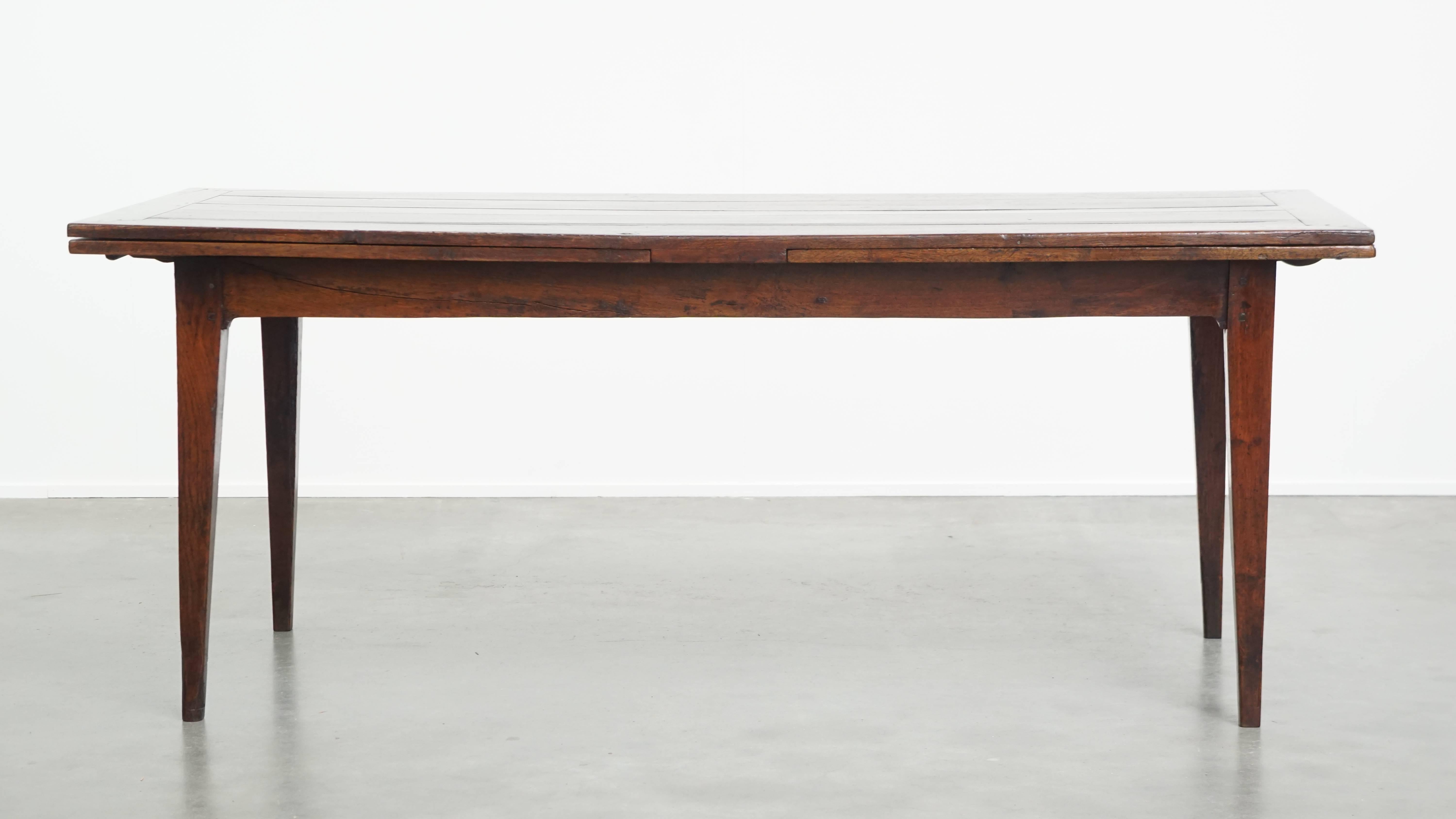 Offered here this antique French oak extendable XXL dining table from the late 18th / early 19th century with a length of 380 cm.

This unique French oak table is a stylish addition for true lovers of genuine, functional antiques. Not only because